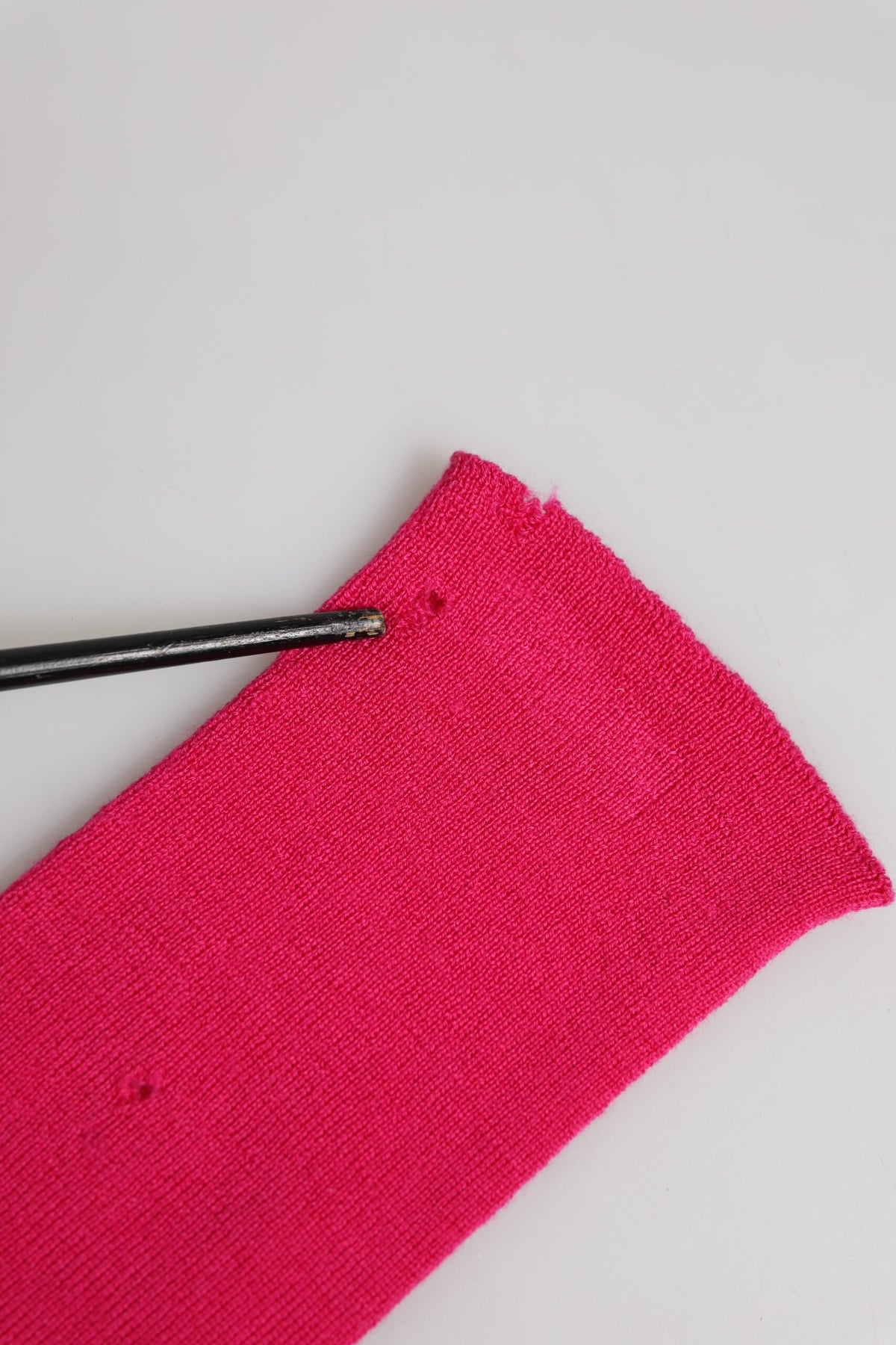 Indulge in the exquisite allure of Dolce & Gabbana Pink Wool Fingerless Elbow Length Mitten Gloves, a testament to Italian craftsmanship and timeless elegance, perfect for the discerning individual.