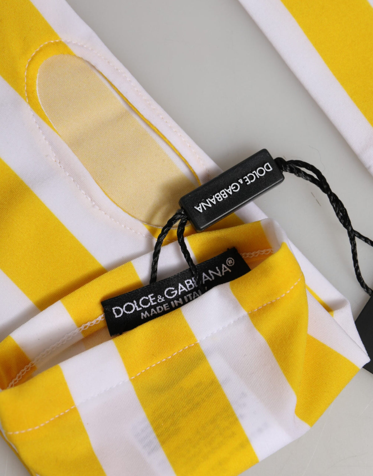 Elevate your style with Dolce & Gabbana Yellow White Nylon Fingerless Gloves, a rare blend of Italian craftsmanship and vibrant design that embodies timeless luxury.