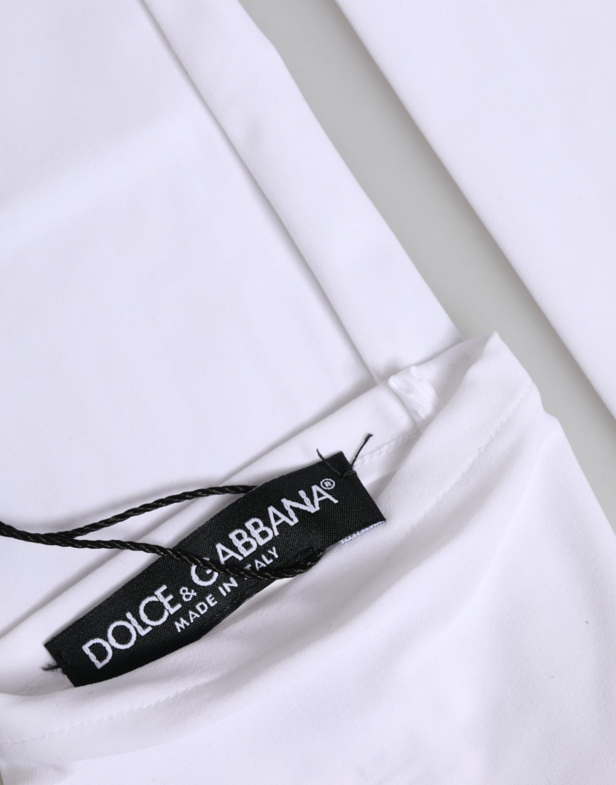 Elevate your style with Dolce & Gabbana's White Nylon Fingerless Elbow Length Gloves, a luxurious blend of exquisite craftsmanship and contemporary elegance, made in Italy.