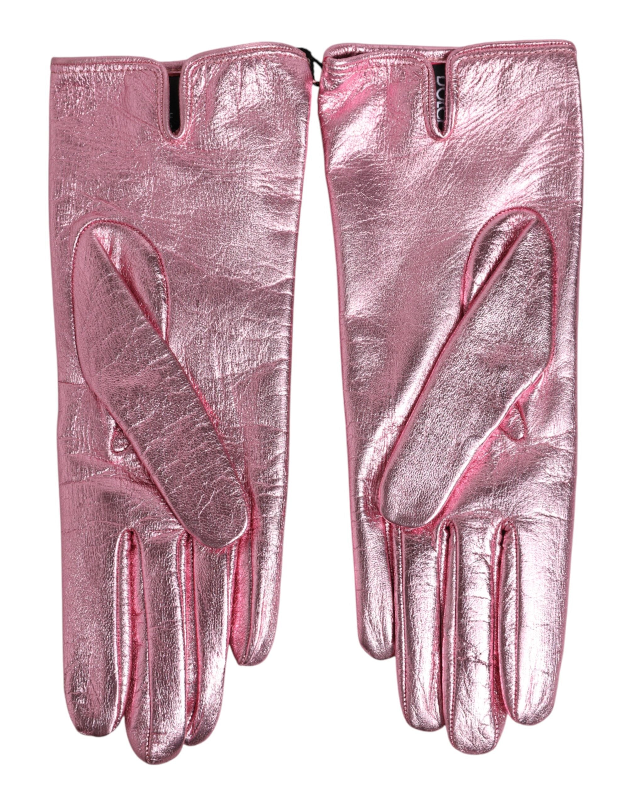 Indulge in the exquisite allure of Dolce & Gabbana's Pink Leather DG Logo Wrist Length Mitten Gloves, a luxurious blend of Italian craftsmanship and vibrant elegance.