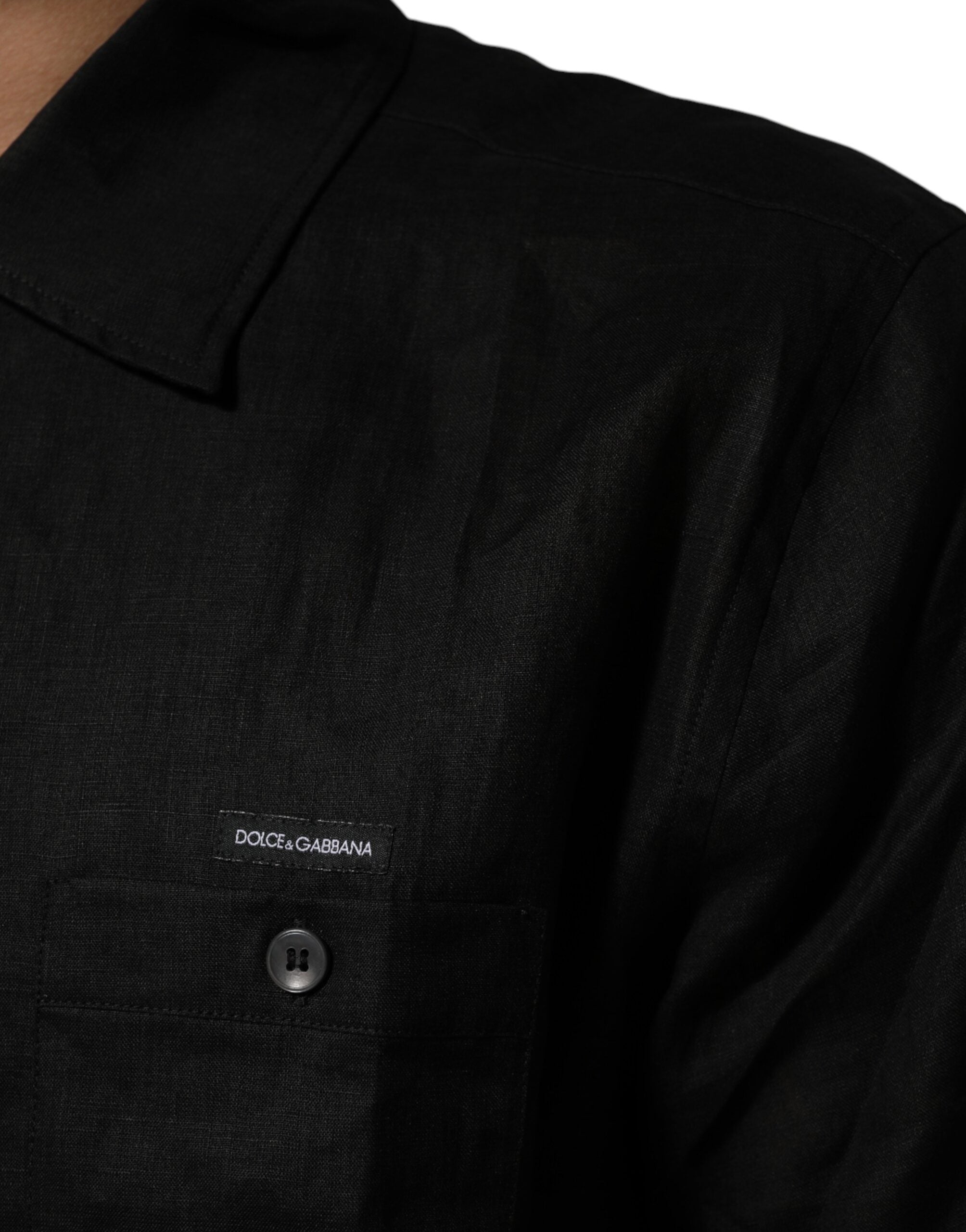 Indulge in the Carhartt Wip Black Linen Collared Short Sleeve Polo Shirt, a masterpiece of Italian craftsmanship, offering timeless elegance and effortless sophistication for discerning tastes.