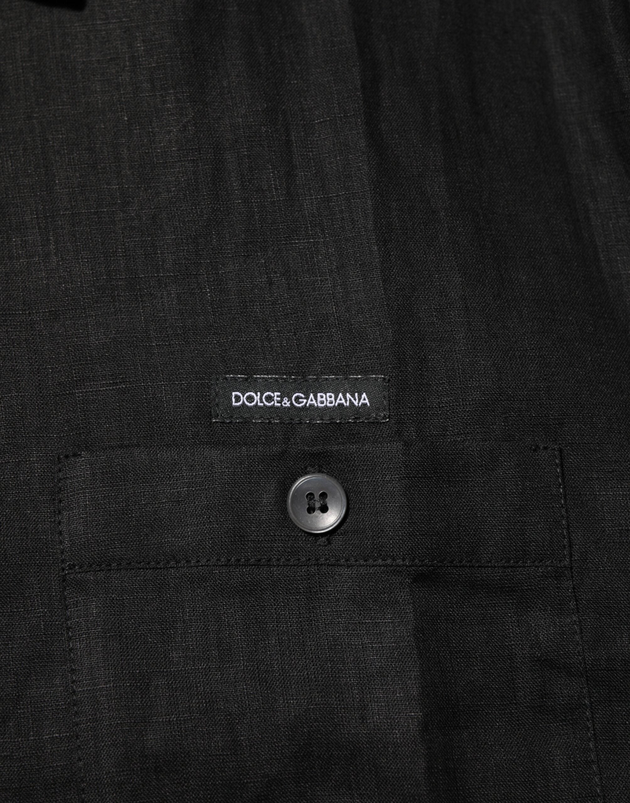 Elevate your wardrobe with the Carhartt Wip Black Linen Collared Short Sleeve Polo Shirt, a timeless blend of luxurious linen and refined craftsmanship, perfect for any occasion.