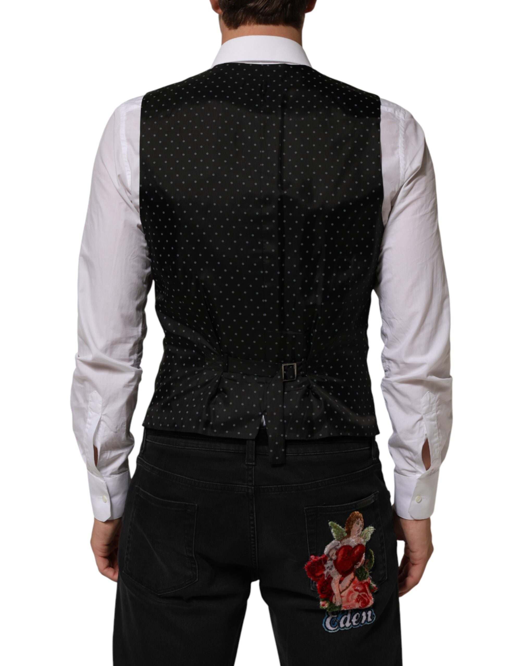 Elevate your formal wardrobe with the Dolce & Gabbana Black Wool Dress Waistcoat Vest, a masterpiece of Italian craftsmanship that embodies timeless elegance and sophistication.