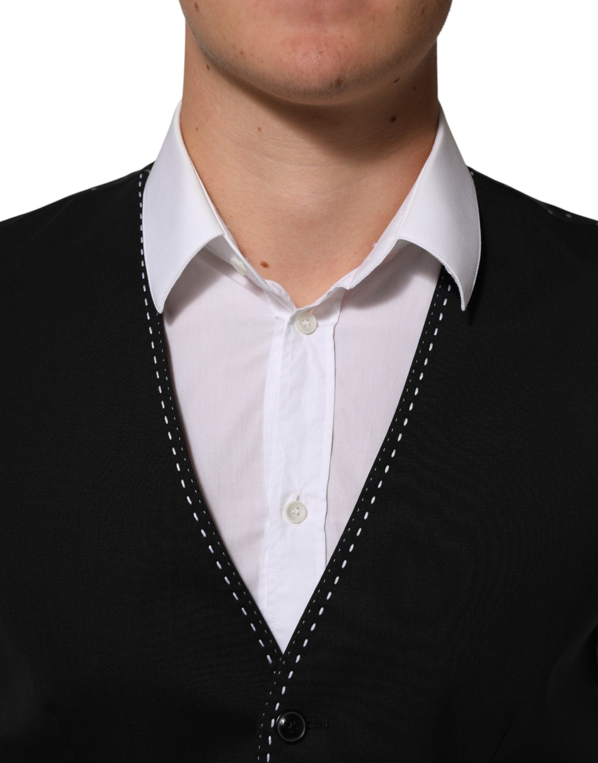 Elevate your formal wardrobe with the Dolce & Gabbana Black Wool Dress Waistcoat Vest, a masterpiece of Italian craftsmanship that embodies timeless sophistication and luxury.