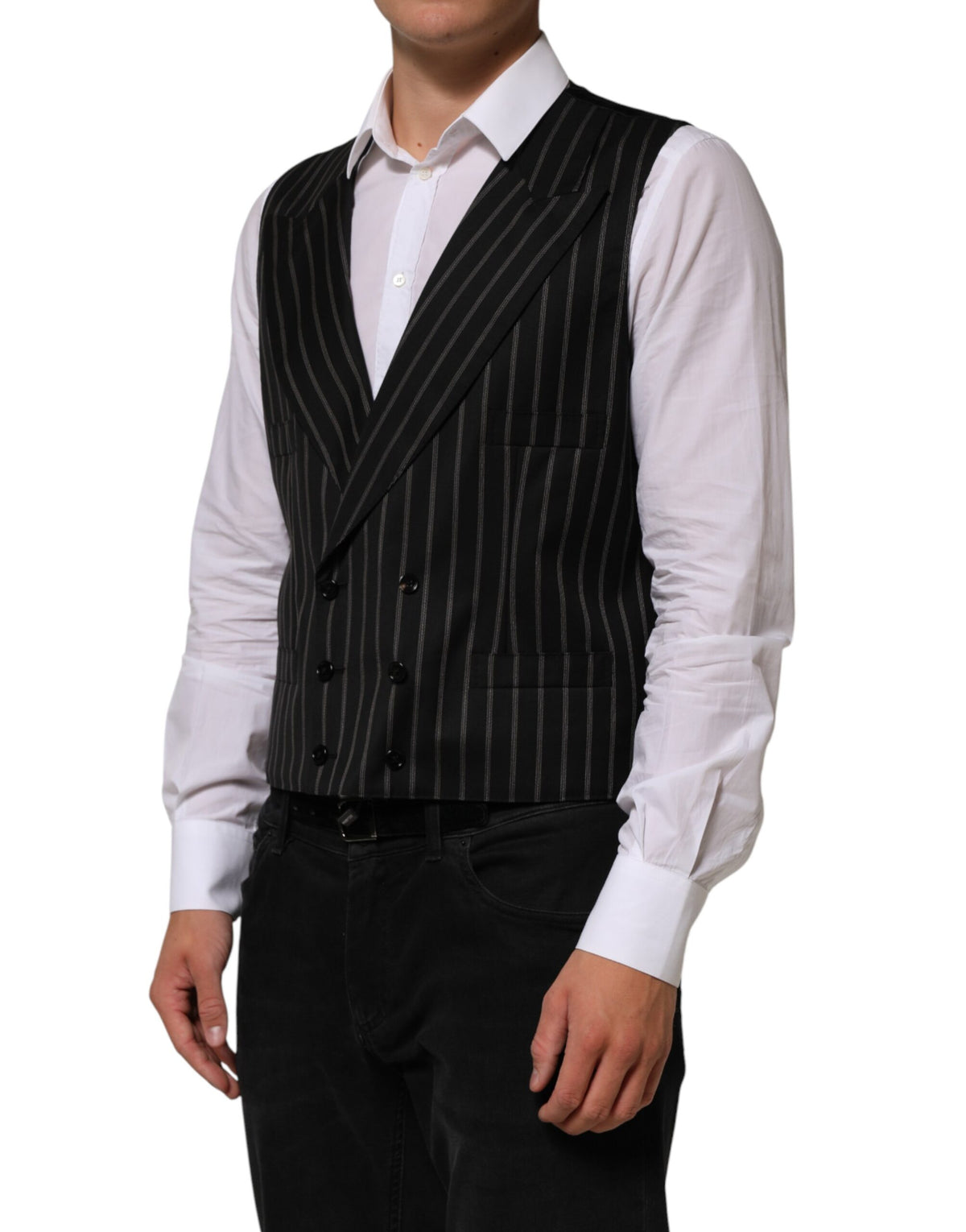 Elevate your formal wardrobe with the Dolce & Gabbana Black Stripes Wool Dress Waistcoat Vest, a timeless blend of luxurious wool and silk that embodies sophistication and Italian craftsmanship.