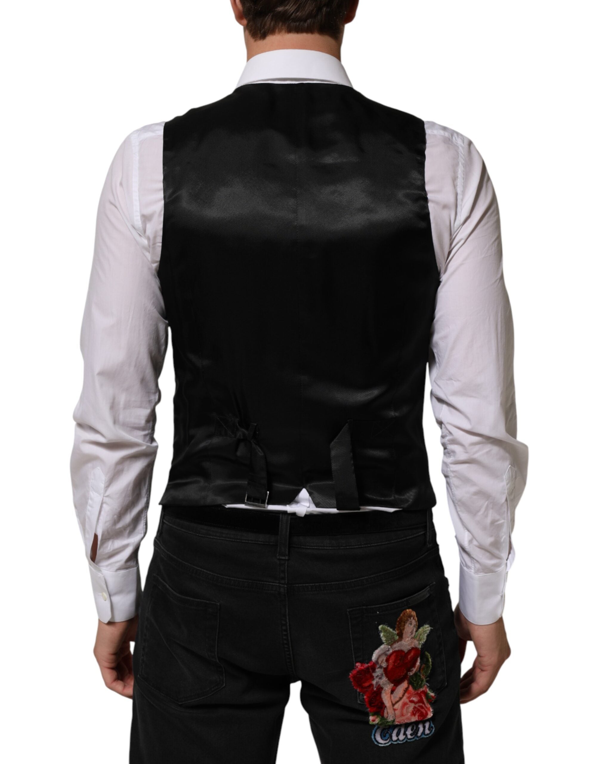 Elevate your elegance with the Dolce & Gabbana Black Polyester Dress Formal Waistcoat Vest, a masterpiece of Italian craftsmanship, perfect for the discerning individual.