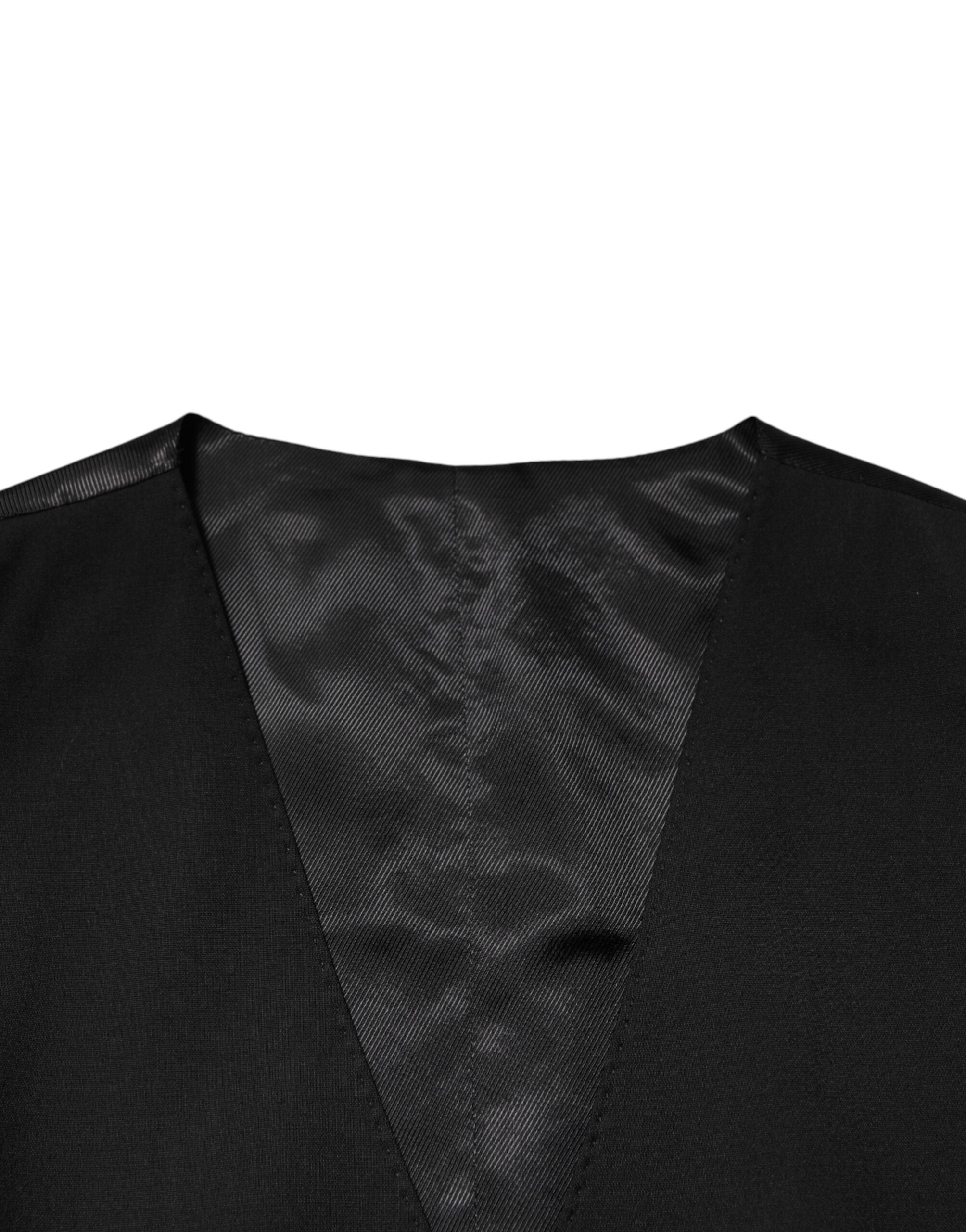 Elevate your elegance with the Dolce & Gabbana Black Polyester Dress Formal Waistcoat Vest, a masterpiece of Italian craftsmanship that embodies timeless sophistication and allure.