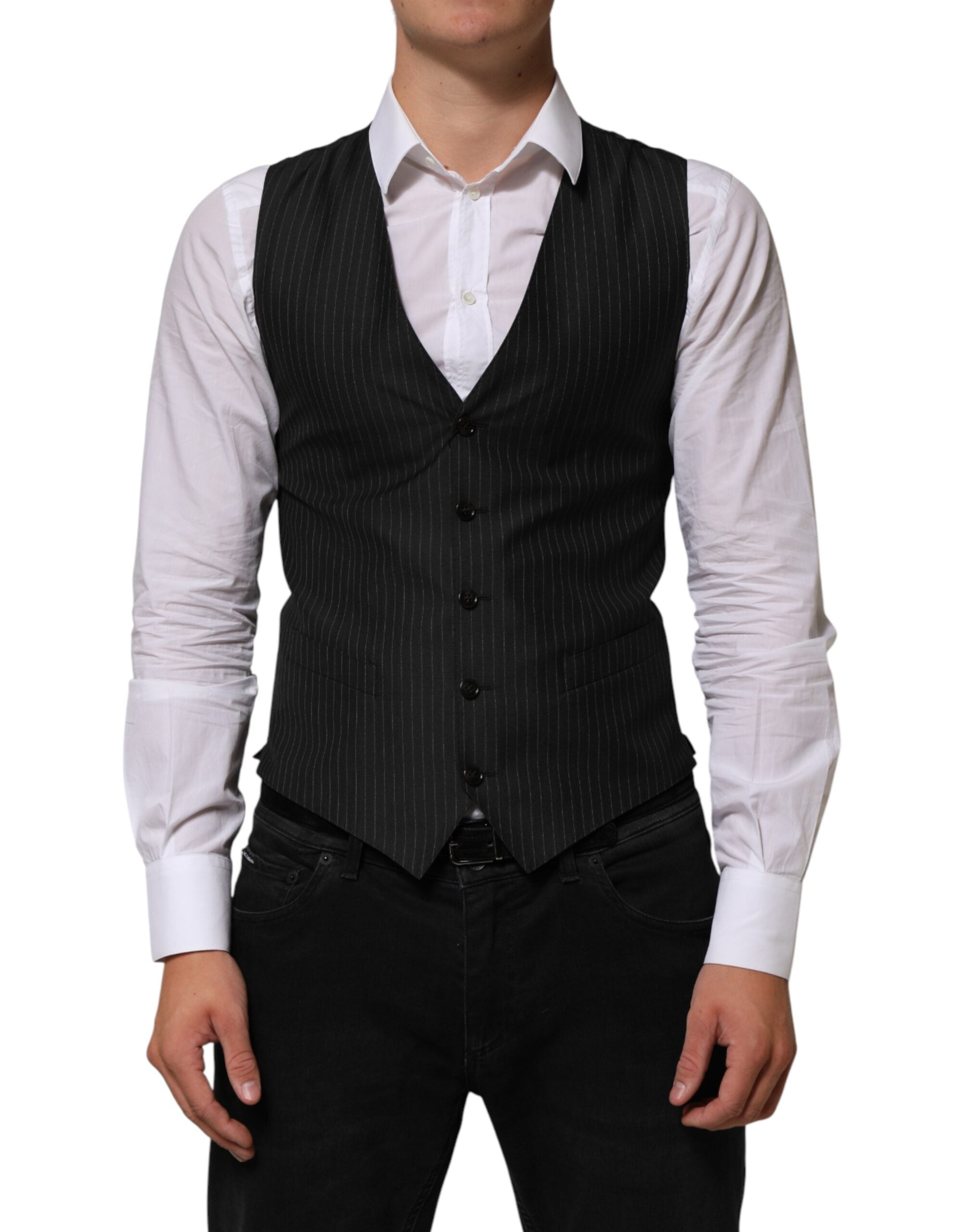 Elevate your wardrobe with the Dolce & Gabbana Black Wool Men Dress Formal Waistcoat Vest, a masterpiece of Italian craftsmanship designed for the discerning individual.