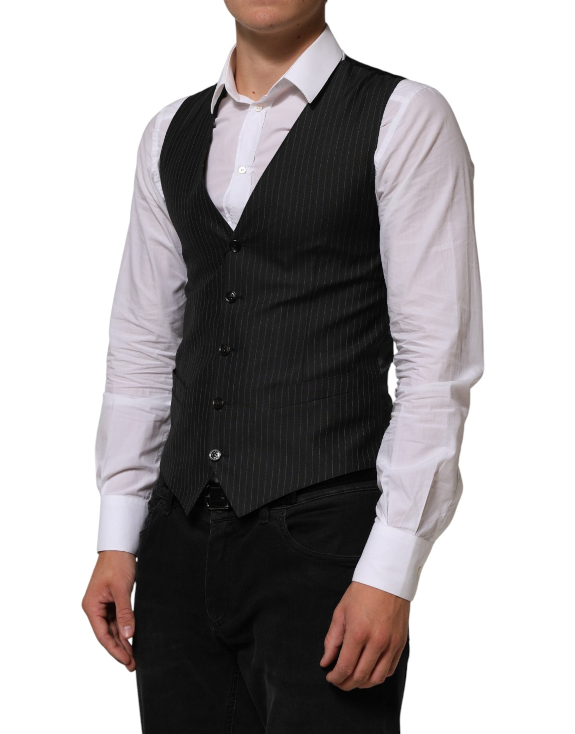 Elevate your wardrobe with the Dolce & Gabbana Black Wool Men Dress Formal Waistcoat Vest, a timeless piece crafted from luxurious materials, embodying exquisite craftsmanship and sophistication.