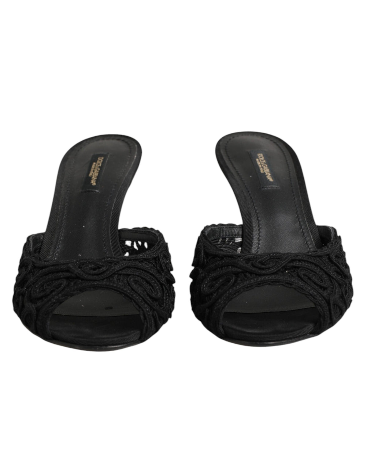 Elevate your elegance with Dolce & Gabbana's Black Embroidered Slip On Heels, crafted in Italy from luxurious materials, embodying sophistication and timeless allure.