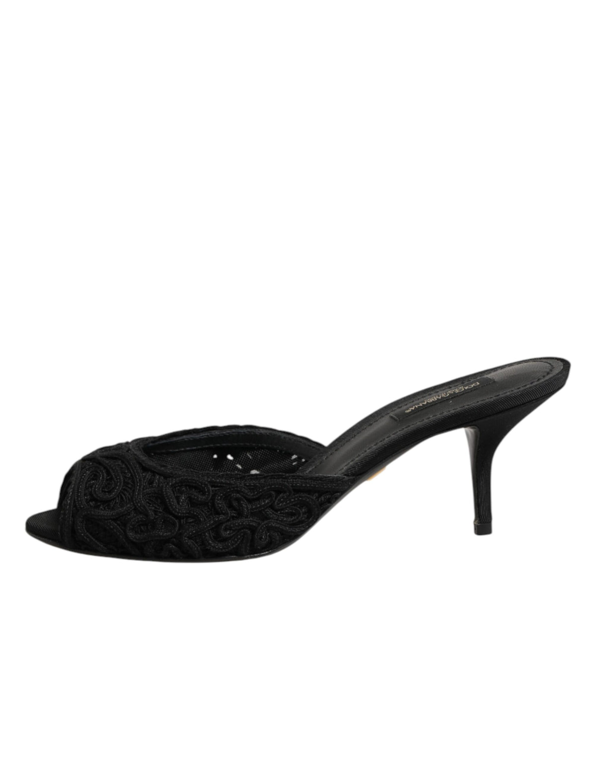 Indulge in the exquisite Dolce & Gabbana Black Embroidered Slip On Heels, crafted in Italy with luxurious materials, elevating your elegance for every occasion.