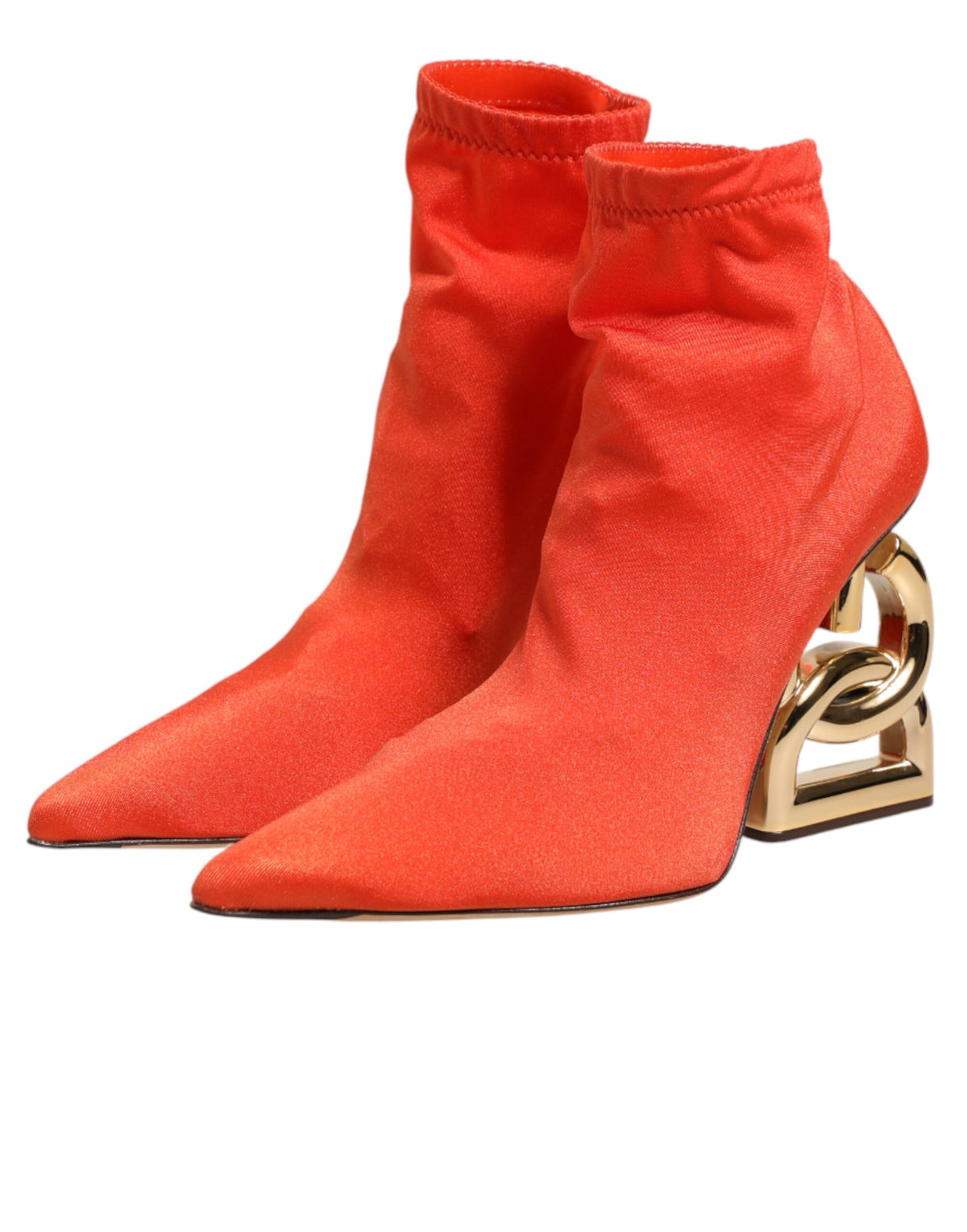 Elevate your style with Dolce & Gabbana's Orange DG Logo Heels Ankle Boots, a luxurious blend of vibrant leather and sculptural design, embodying modern sophistication.