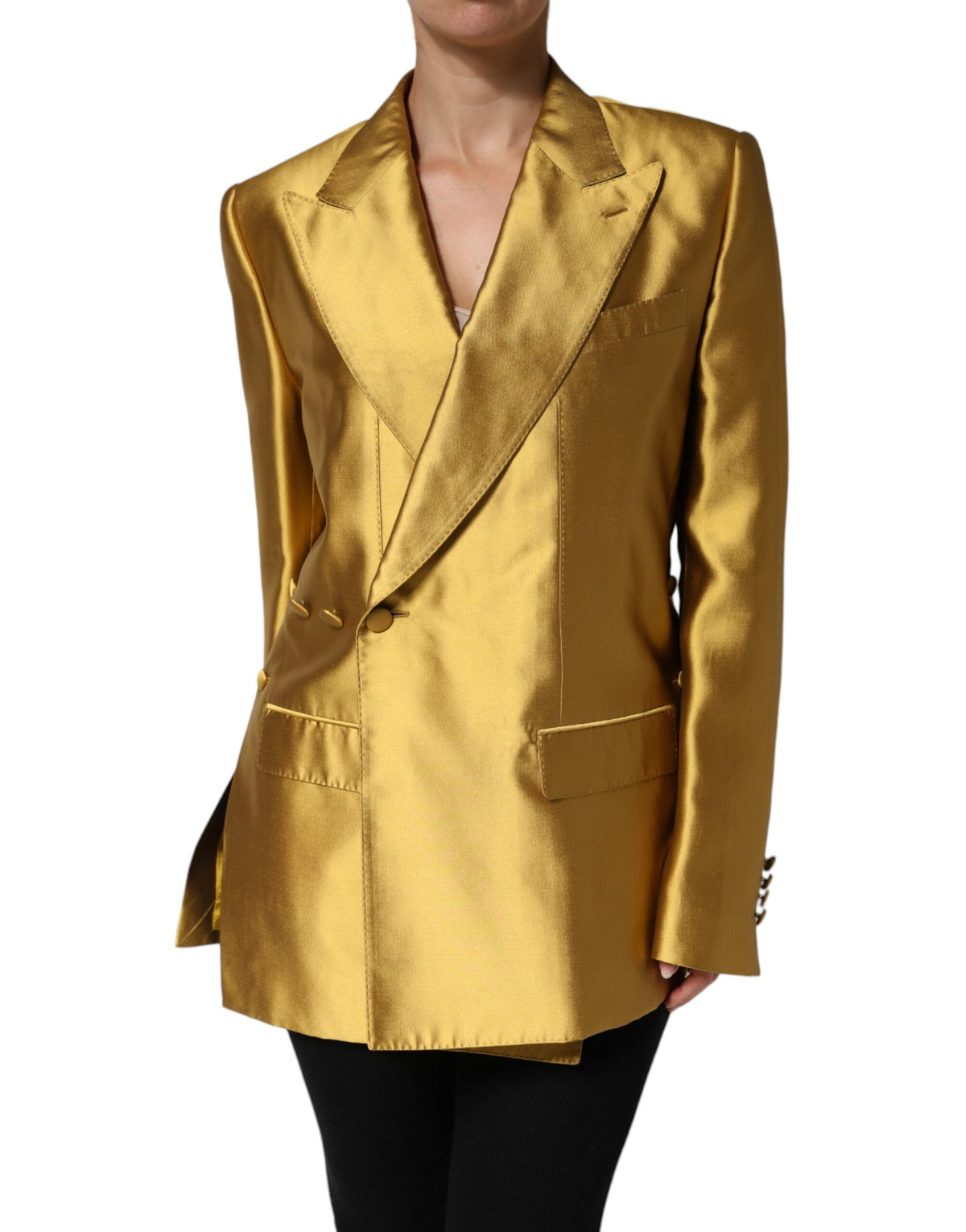 Elevate your elegance with the Dolce & Gabbana Gold Satin Blazer, a masterpiece of silk craftsmanship that embodies luxury and sophistication for every occasion.