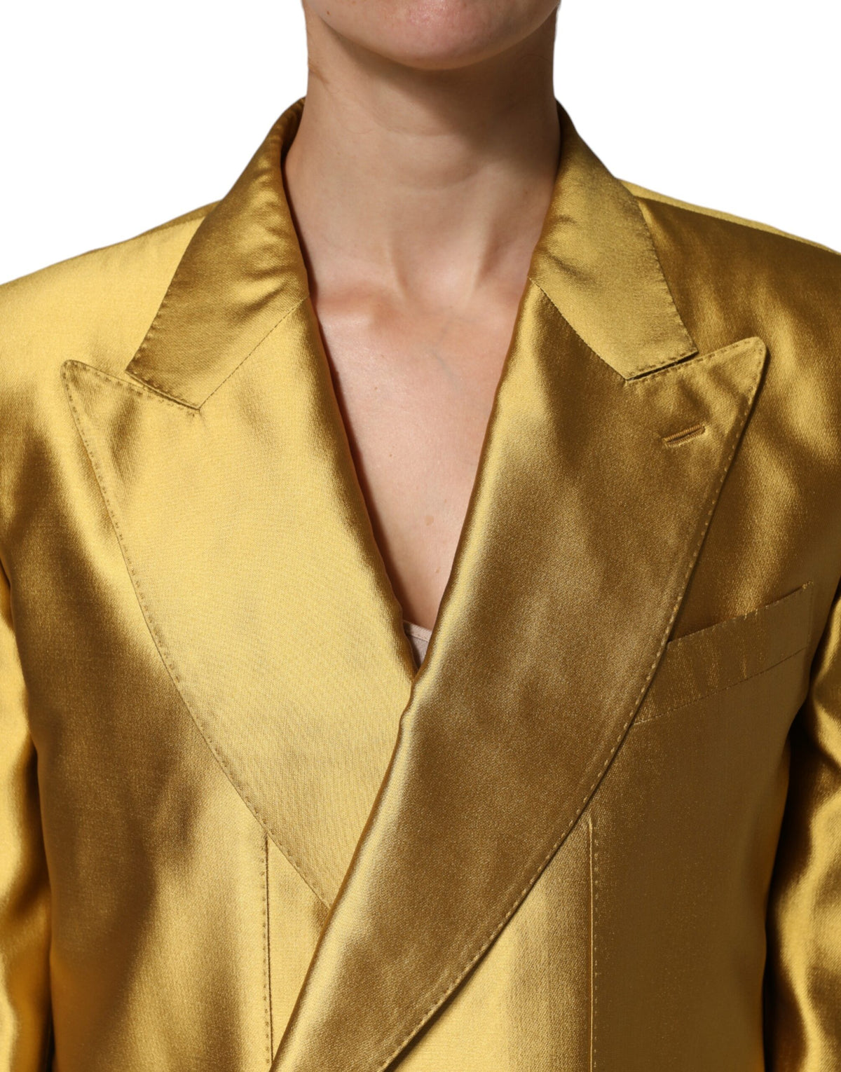 Elevate your elegance with the Dolce & Gabbana Gold Satin Blazer, a timeless masterpiece of silk craftsmanship, perfect for the discerning individual who embodies luxury.