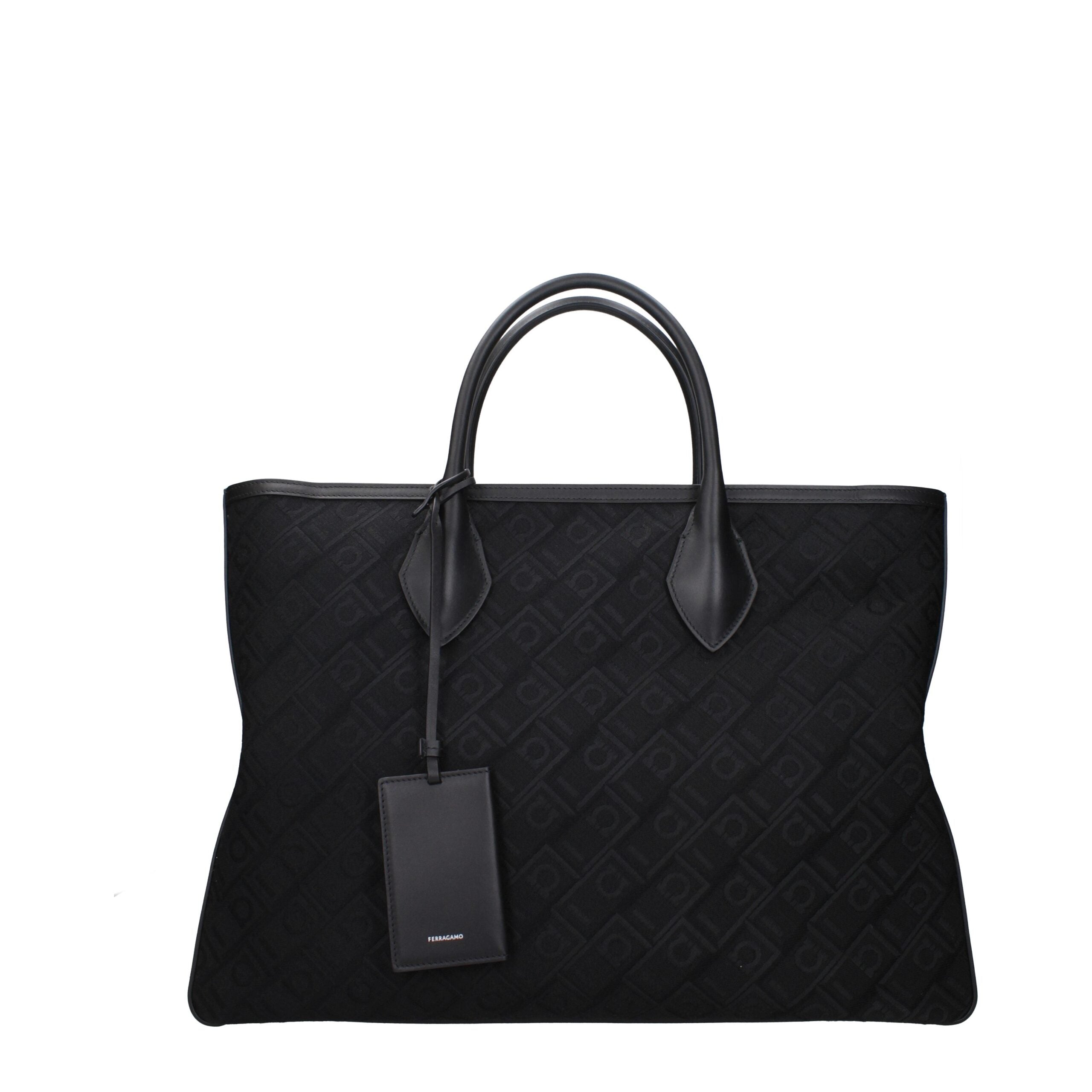 Discover the Salvatore Ferragamo Black Fabric Handbag, a masterpiece of Italian craftsmanship that redefines elegance and sophistication for the discerning individual.