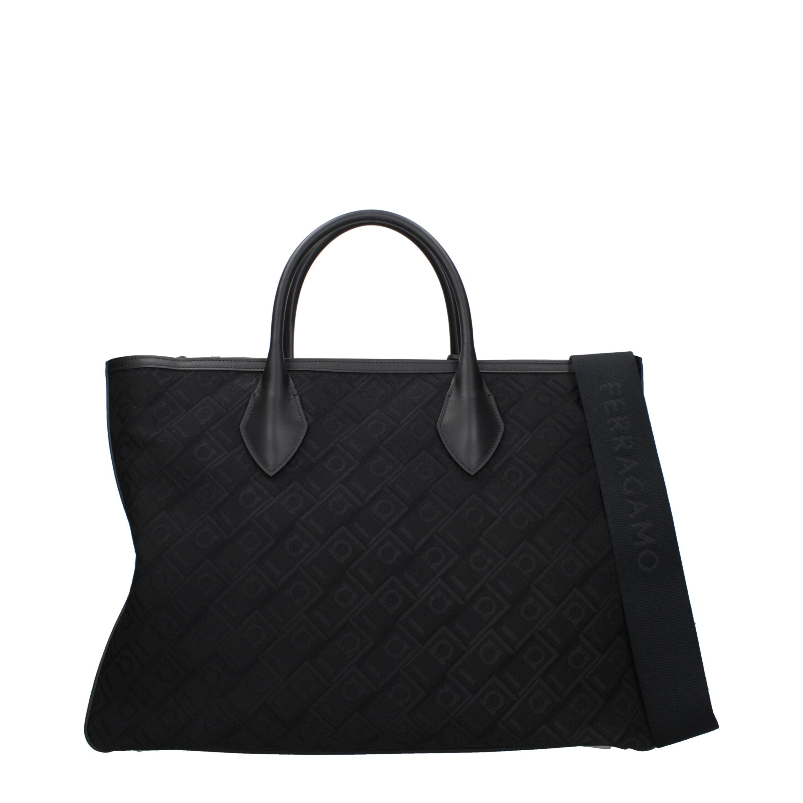 Elevate your elegance with the Salvatore Ferragamo Black Fabric Handbag, a masterpiece of Italian craftsmanship that embodies timeless luxury and sophistication.