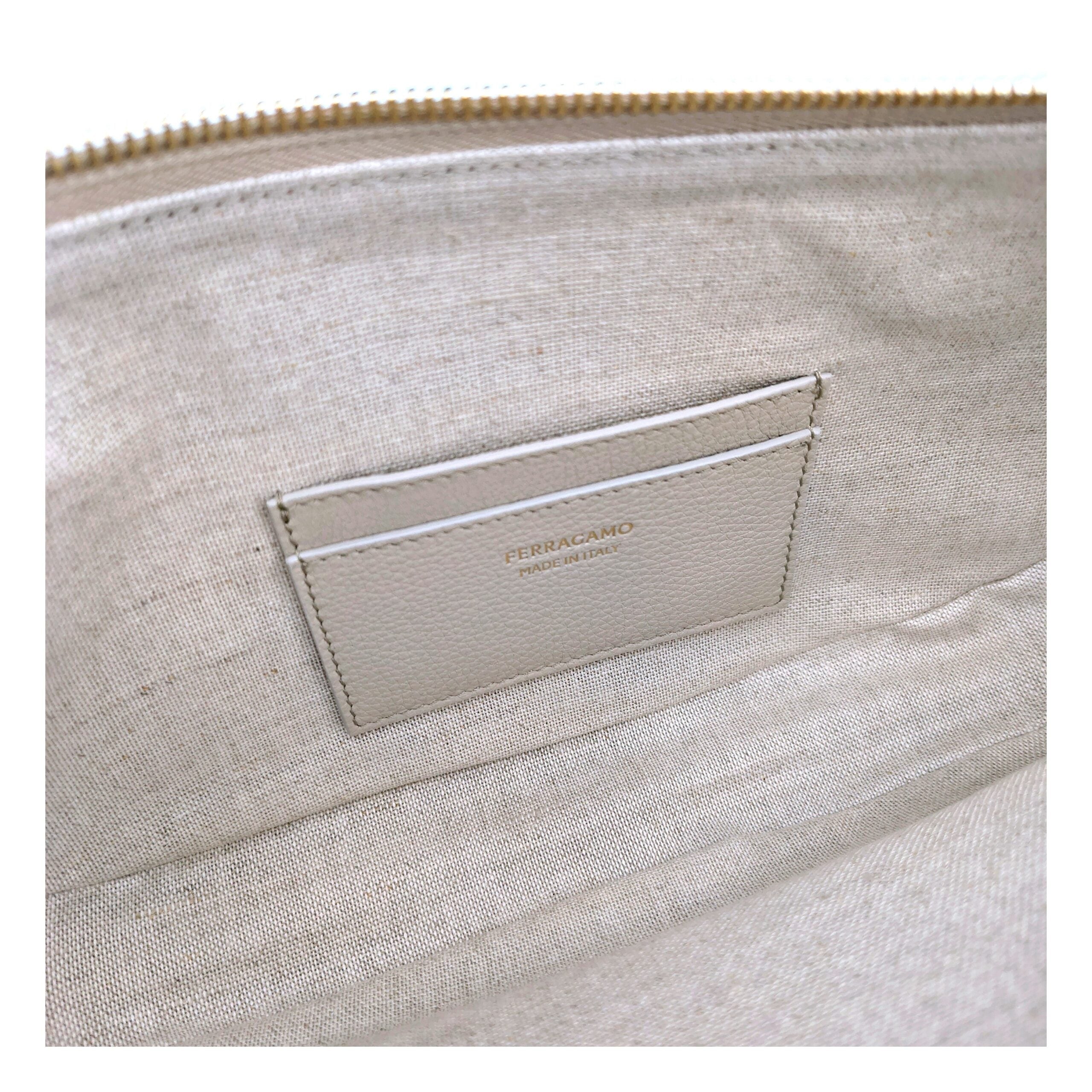 Elevate your style with the Salvatore Ferragamo Gray Leather Shoulder Bag, a masterpiece of exquisite craftsmanship and timeless elegance, perfect for the discerning connoisseur.