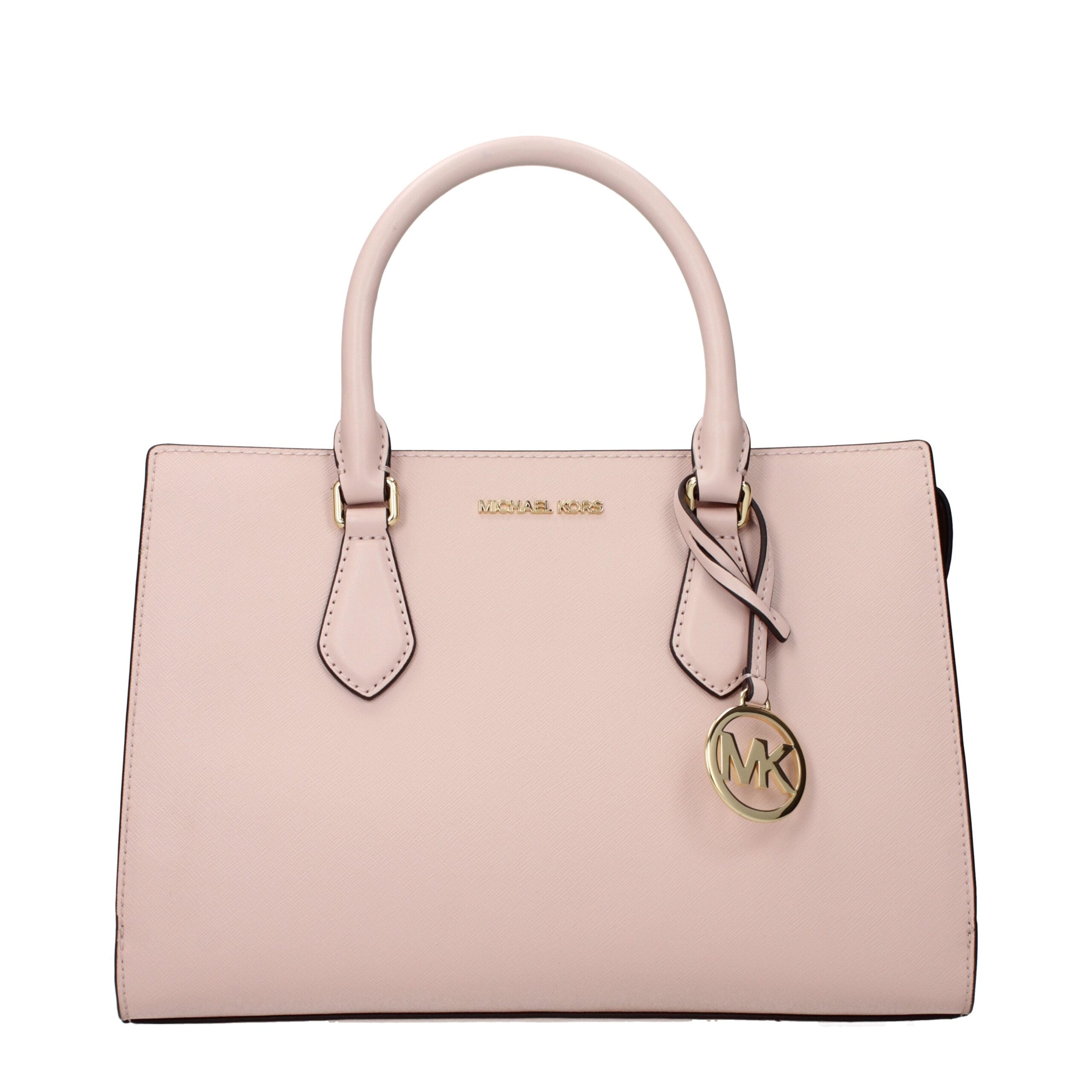 Elevate your elegance with the Michael Kors Pink Fabric Handbag, a timeless masterpiece of exquisite craftsmanship, perfect for the discerning individual.