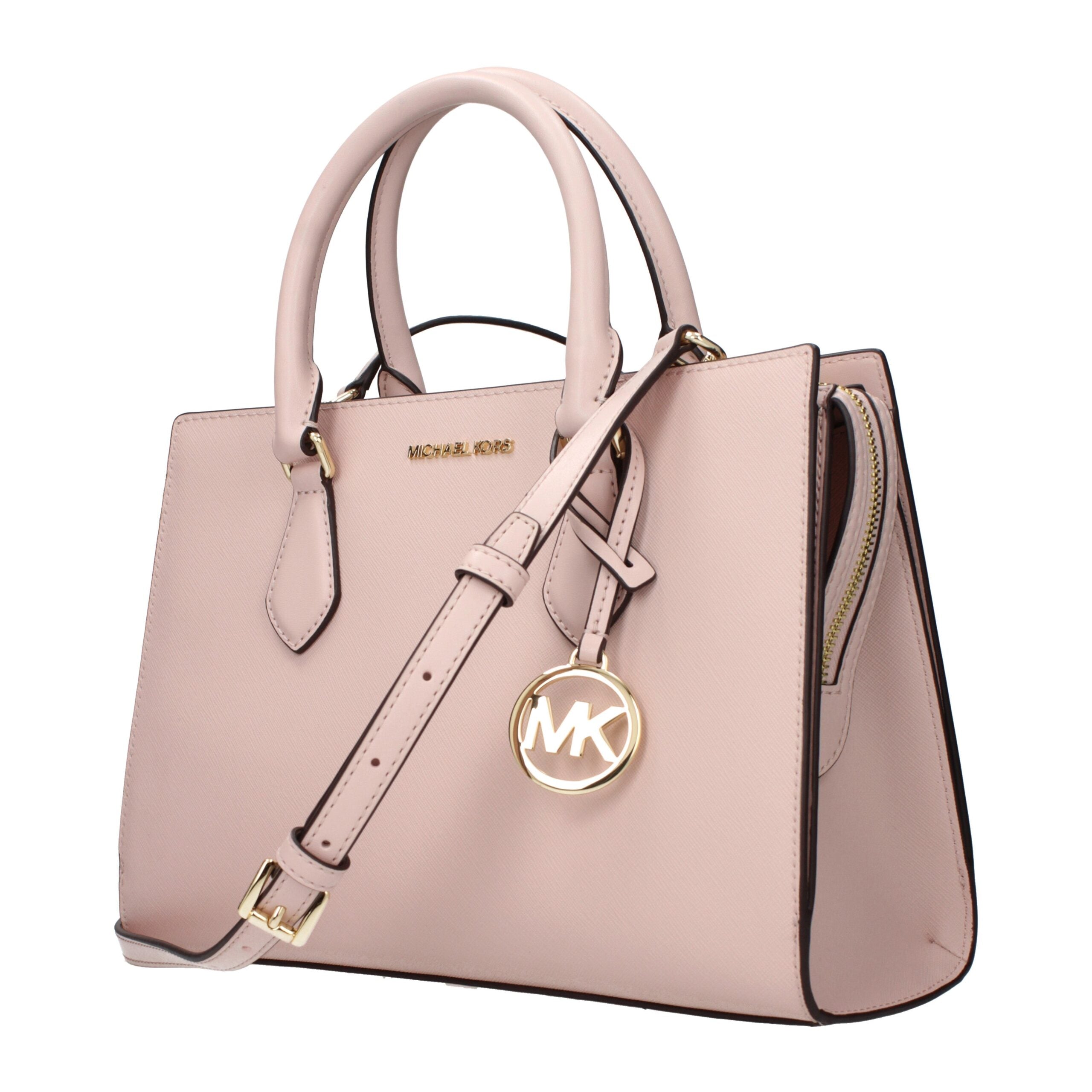 Elevate your elegance with the Michael Kors Pink Fabric Handbag, a symbol of artisanal luxury and timeless sophistication, perfect for the discerning individual.