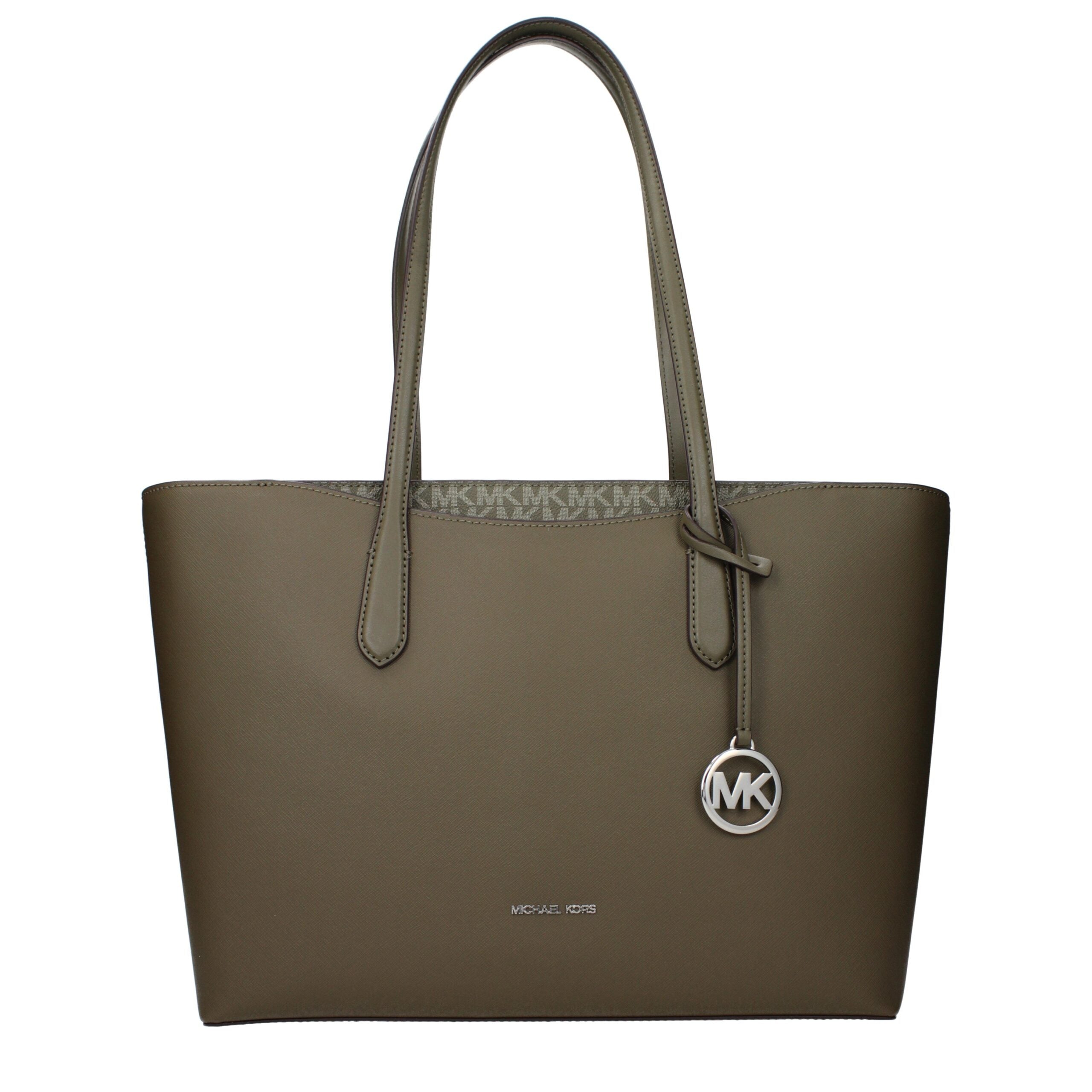 Discover the Michael Kors Green Fabric Shoulder Bag, a luxurious blend of sophistication and versatility, perfect for elevating any ensemble with timeless elegance.