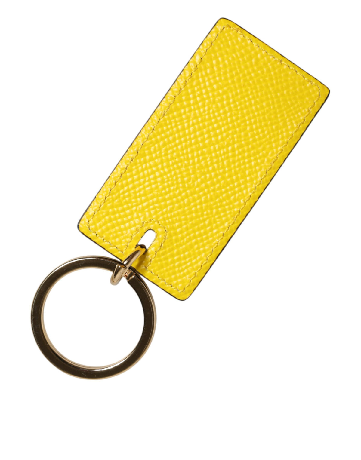 Elevate your style with the Dolce & Gabbana Yellow Calf Leather Keychain, a symbol of exquisite craftsmanship and luxurious elegance for the discerning connoisseur.