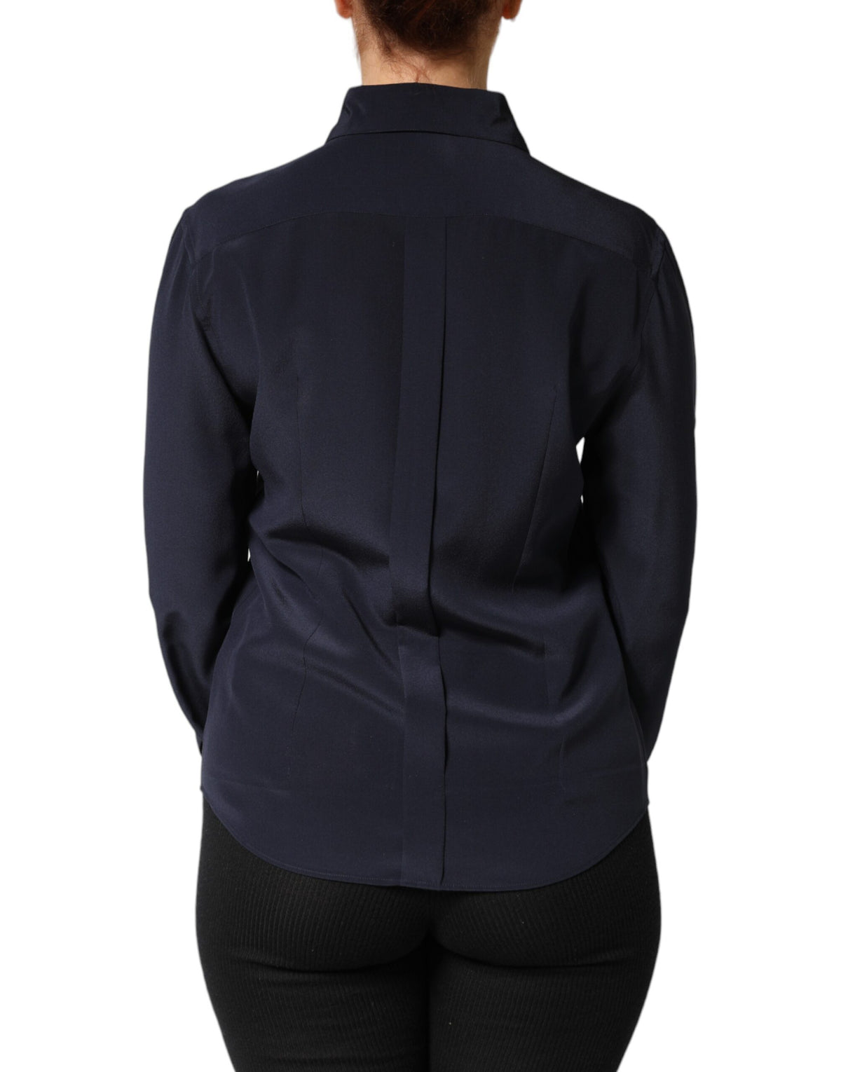 Indulge in the elegance of Dolce & Gabbana's Blue Collared Long Sleeves Dress Shirt Top, crafted in Italy from luxurious materials, embodying timeless sophistication for the discerning individual.