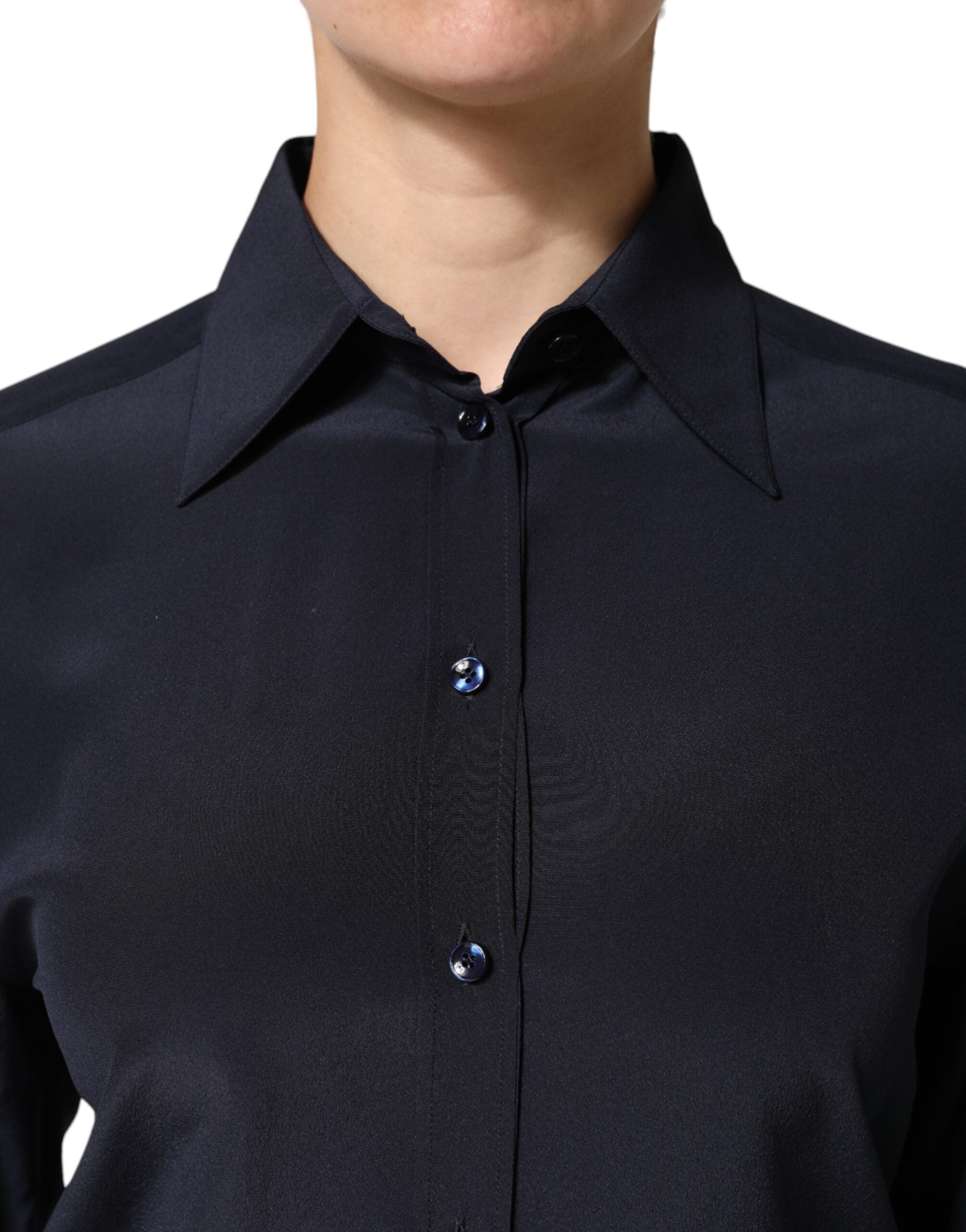 Discover the Dolce & Gabbana Blue Collared Long Sleeves Dress Shirt Top, a testament to Italian craftsmanship that embodies luxury and elegance for the discerning individual.
