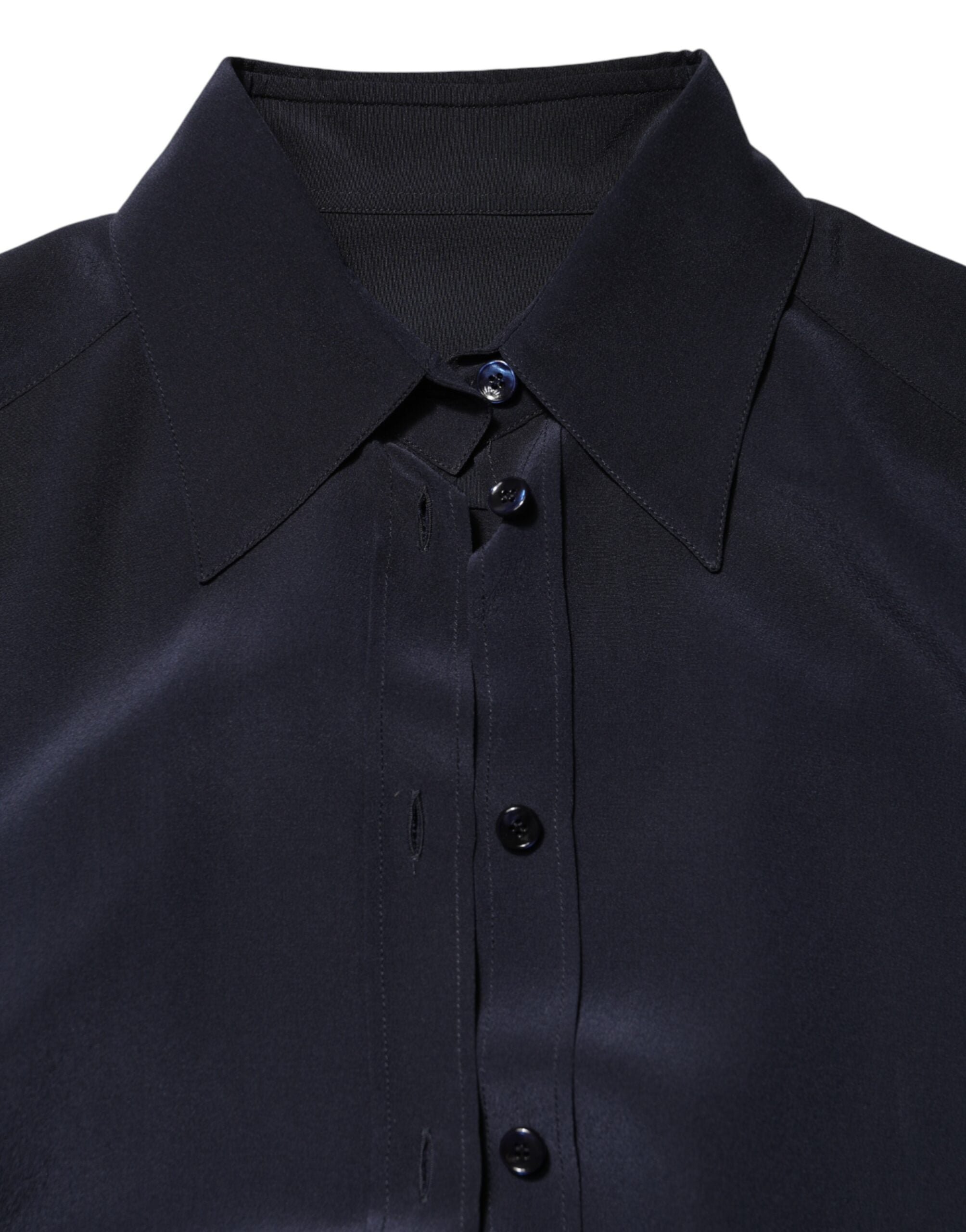 Discover the Dolce & Gabbana Blue Collared Long Sleeves Dress Shirt Top, a testament to Italian craftsmanship and timeless elegance, perfect for the discerning individual.