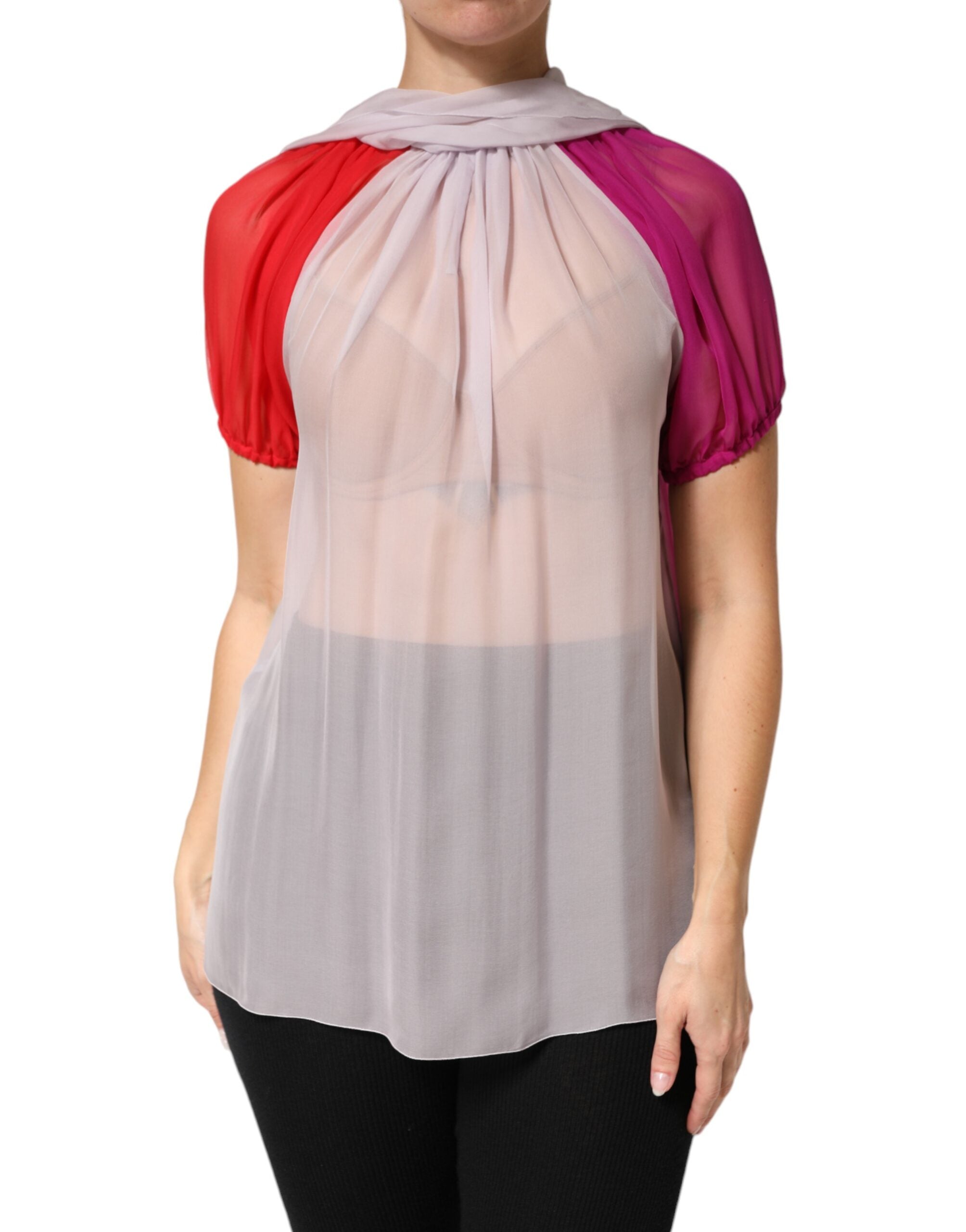 Elevate your wardrobe with the Dolce & Gabbana Multicolor Short Sleeves Silk Blouse, a luxurious testament to Italian craftsmanship and timeless elegance.