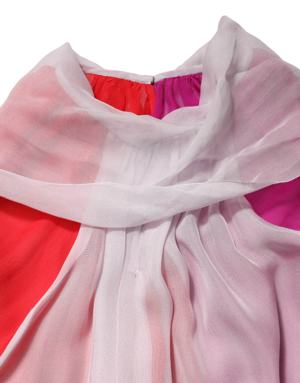 Elevate your wardrobe with the Dolce & Gabbana Multicolor Short Sleeves Silk Blouse, a luxurious silk masterpiece that embodies Italian craftsmanship and timeless elegance.