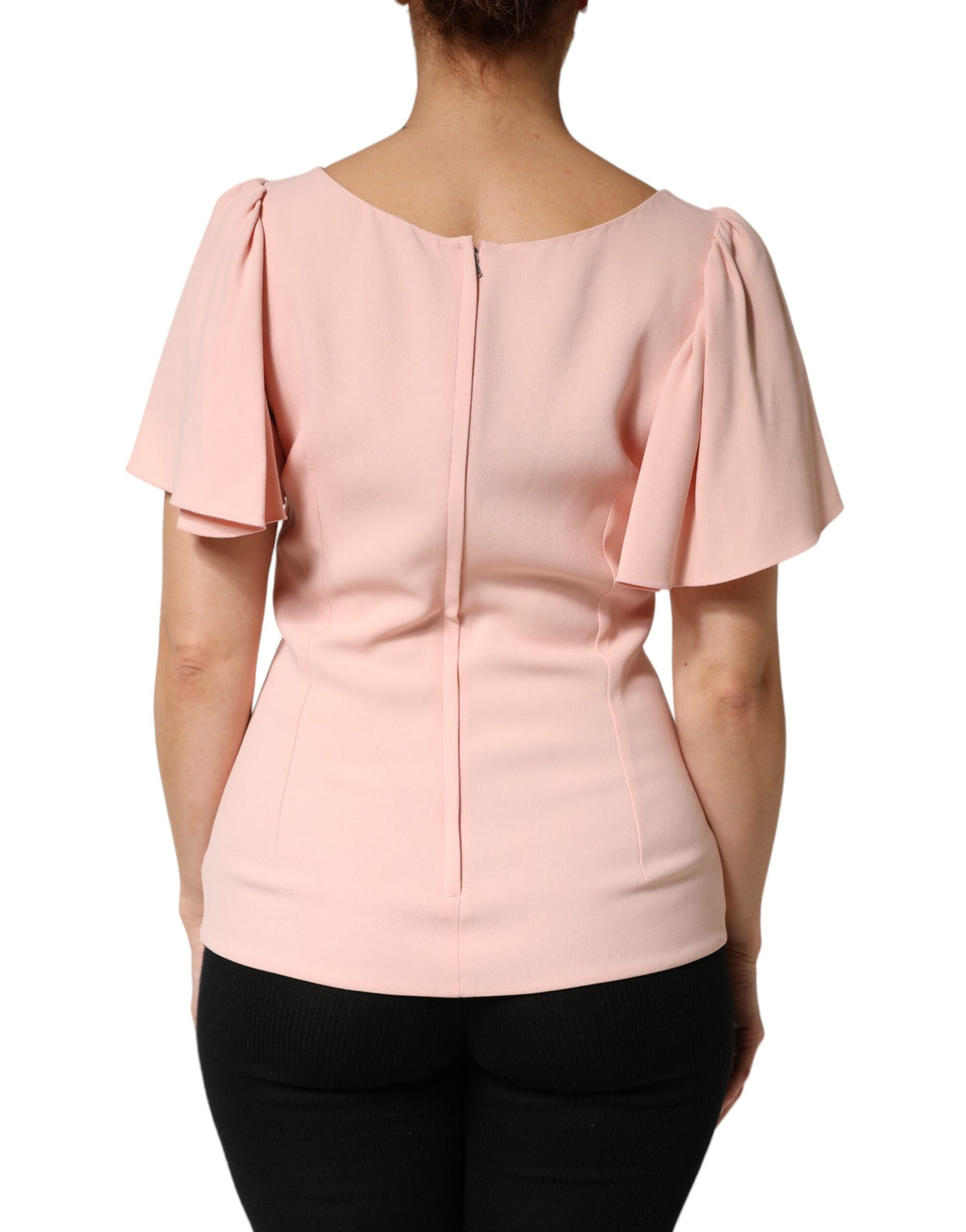 Elevate your wardrobe with the Dolce & Gabbana Pink Short Sleeves Round Neck Blouse Top, crafted in Italy from luxurious materials for timeless elegance and exquisite style.