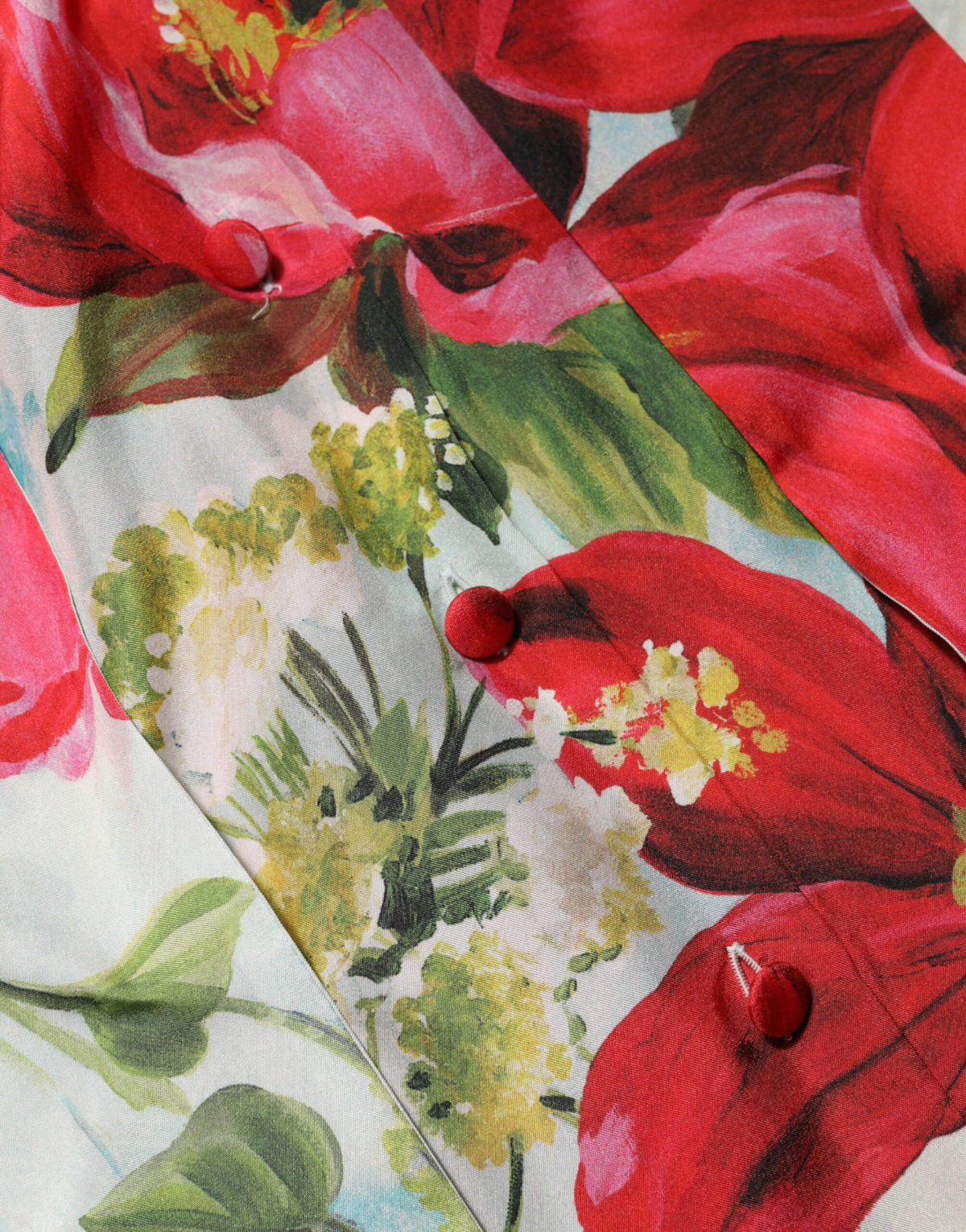 Indulge in the exquisite Dolce & Gabbana Multicolor Floral Long Sleeves Blouse, a silk masterpiece that embodies timeless elegance and Italian craftsmanship for the discerning wardrobe.