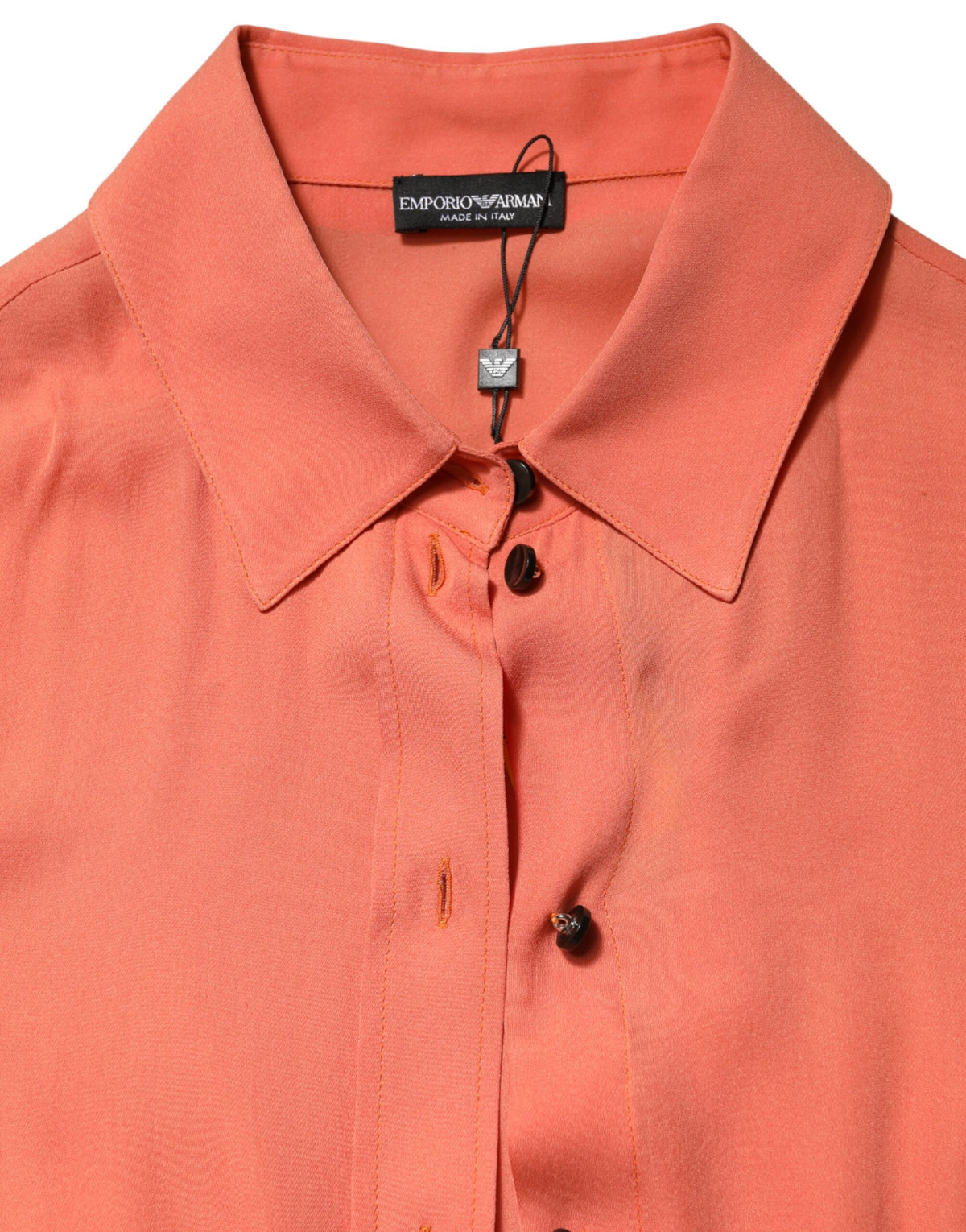 Elevate your wardrobe with the Emporio Armani Orange Collared Button Down Top, a masterpiece of Italian craftsmanship that embodies vibrant elegance and timeless allure.