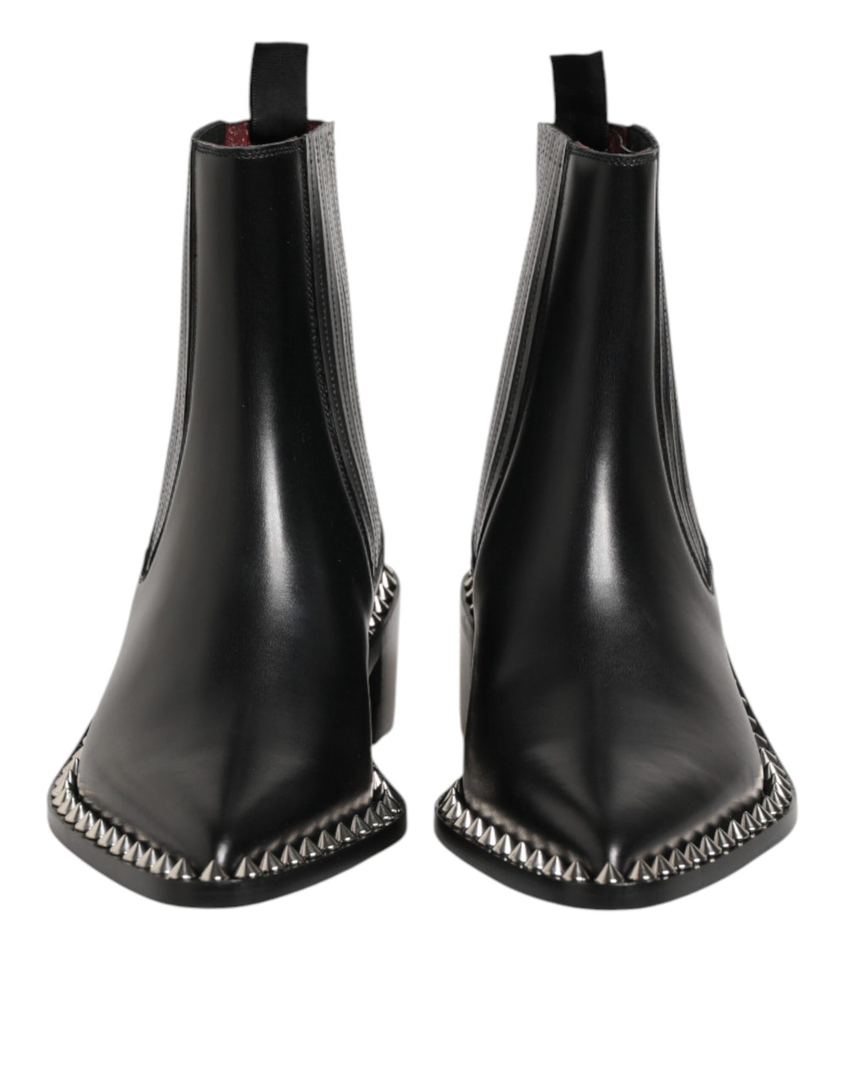Indulge in the exquisite Dolce & Gabbana Black Studded Chelsea Short Ankle Boots, where premium leather meets Italian craftsmanship, elevating your style with timeless elegance.