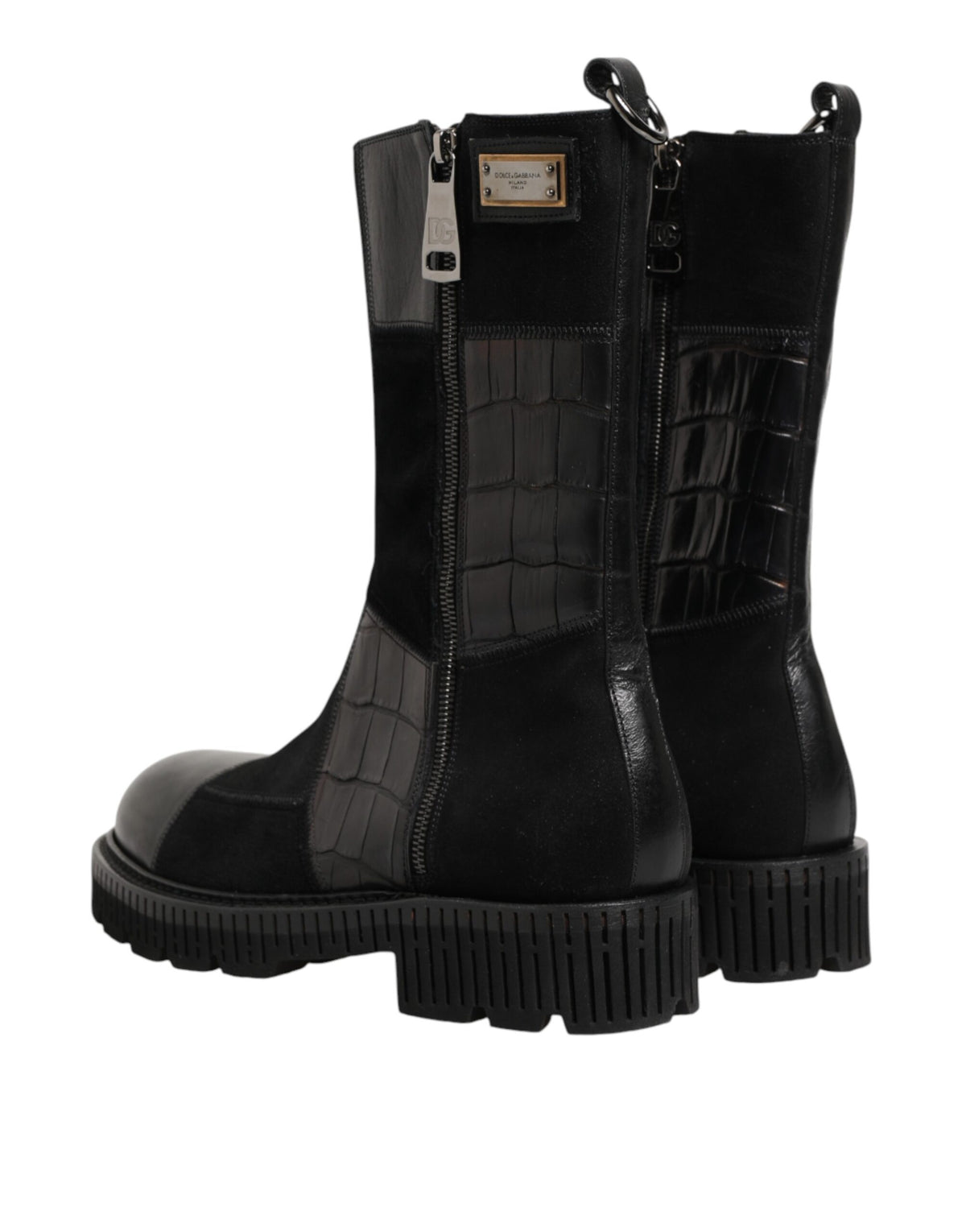 Indulge in the exquisite Dolce & Gabbana Black Patchwork Leather Mid Calf Boot, a masterpiece of Italian craftsmanship blending luxurious horse and crocodile leather for timeless elegance.