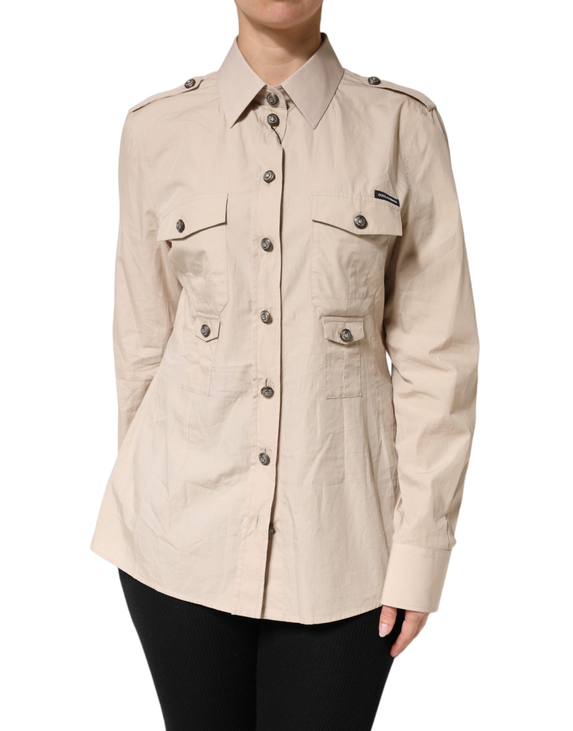 Discover the Dolce & Gabbana beige collared long sleeve cotton shirt top, a masterpiece of Italian craftsmanship that embodies timeless elegance and sophisticated allure.
