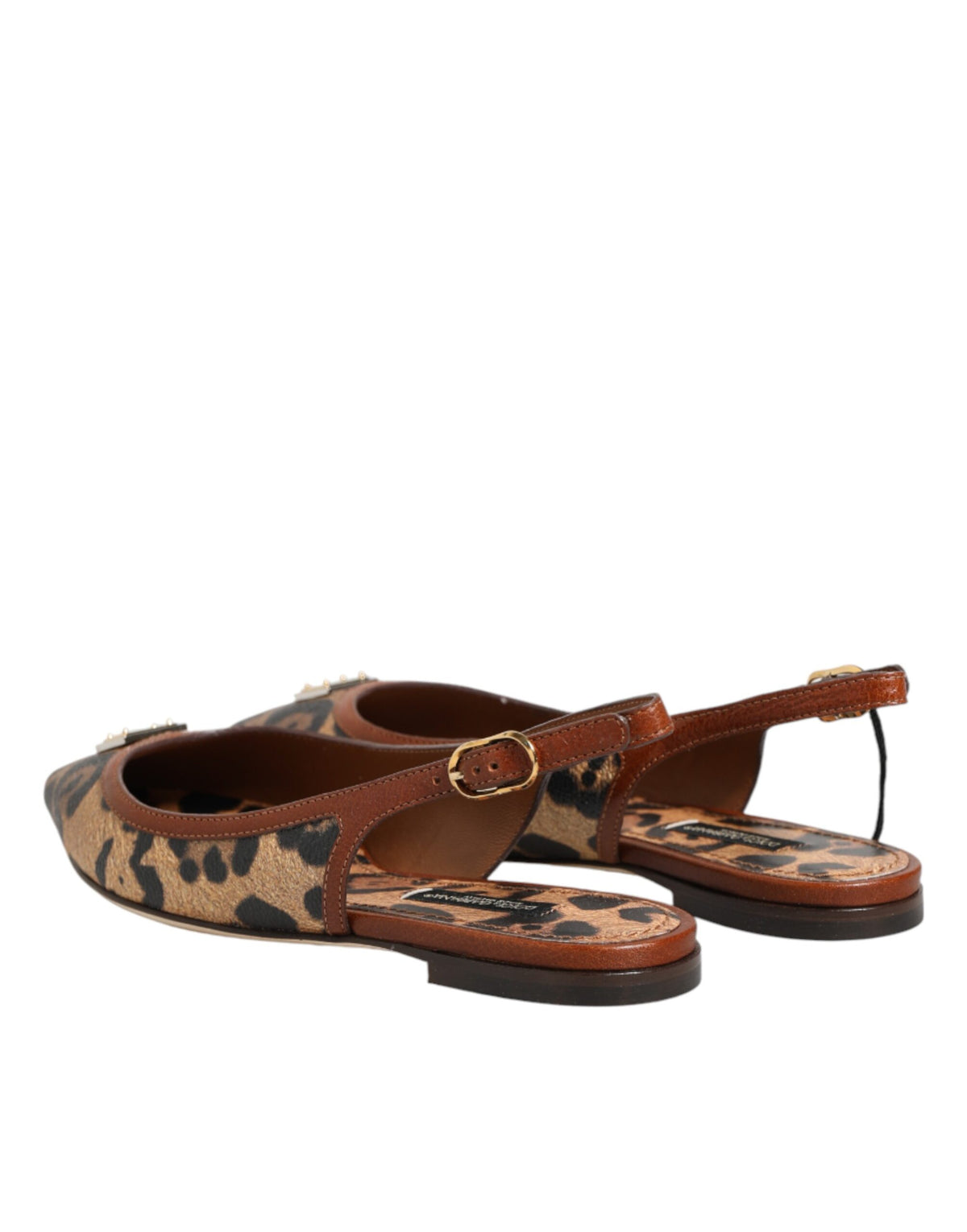 Indulge in the exquisite allure of Dolce & Gabbana's Brown Leopard Slingback Flats, where luxurious craftsmanship meets sophisticated style for the discerning individual.