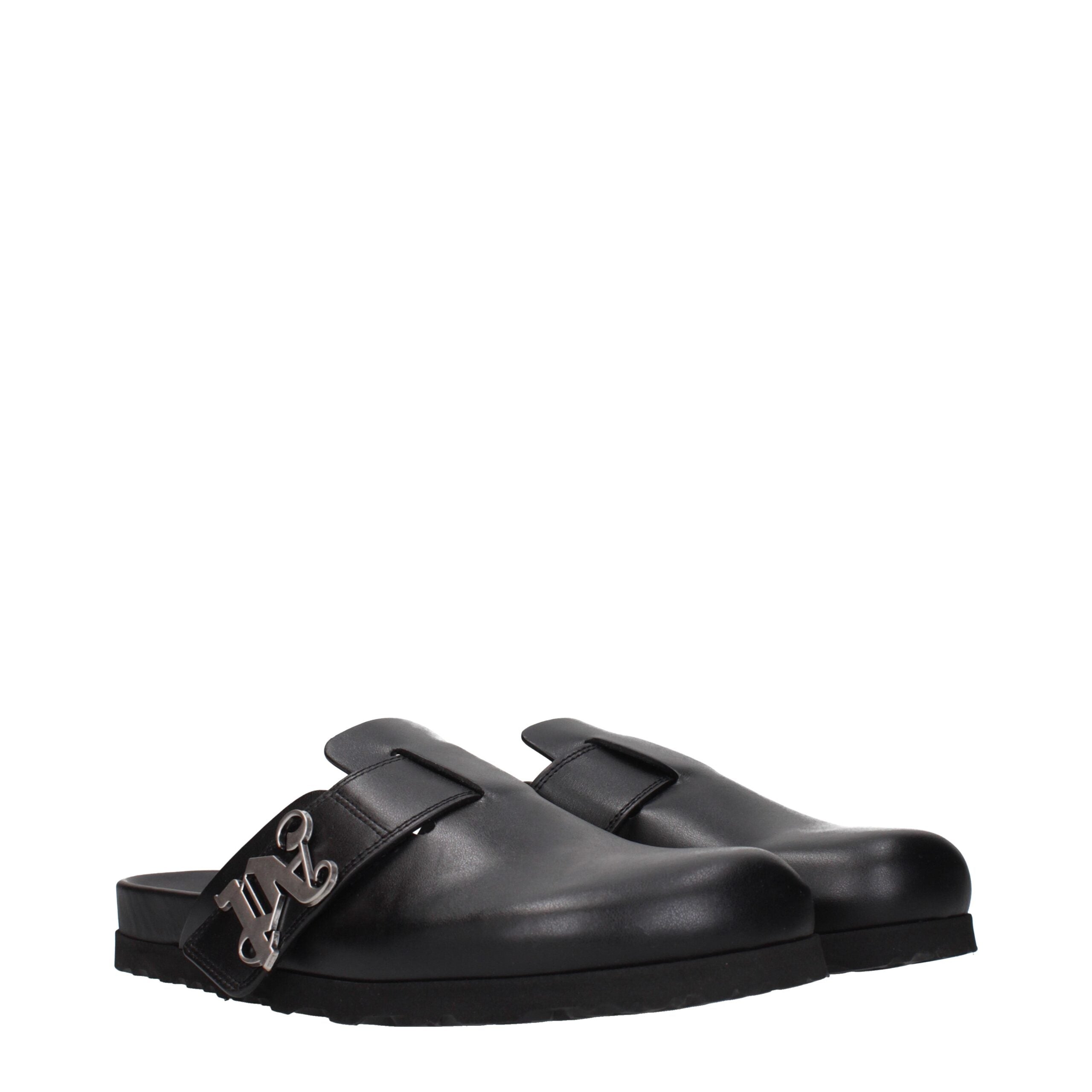 Experience the opulence of Palm Angels Black Leather Slippers, where exquisite craftsmanship meets refined elegance, perfect for those who embrace luxury and sophistication.