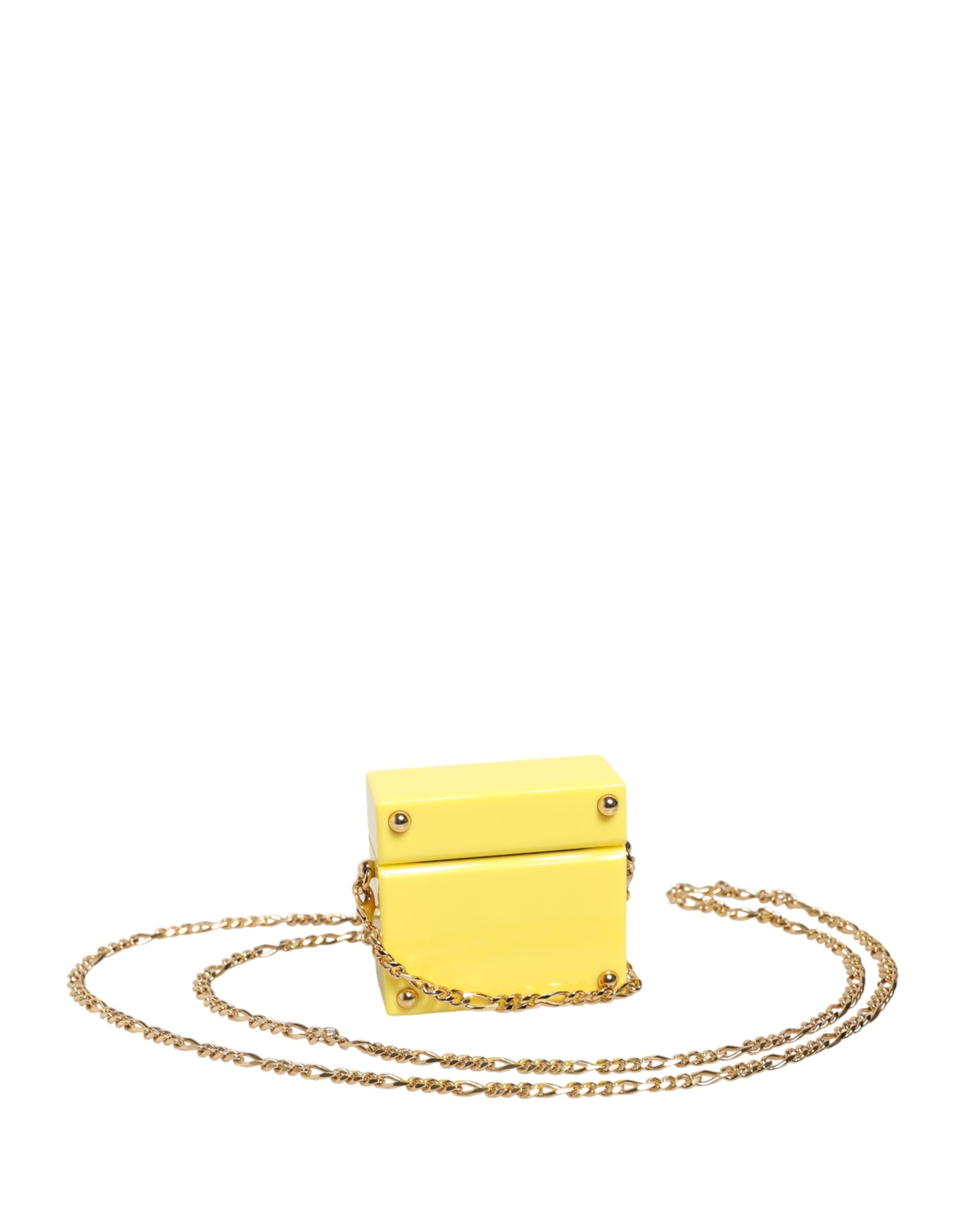 Indulge in the exquisite Dolce & Gabbana Yellow DG Logo Plaque AirPods Case, a luxurious blend of elegance and practicality, crafted for the discerning individual.
