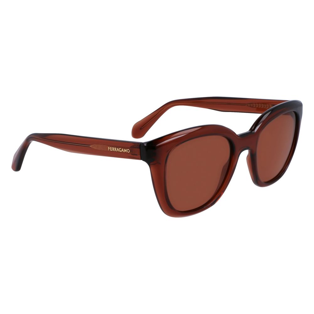 Experience the allure of Ferragamo Brown Injected Sunglasses, where exquisite craftsmanship meets timeless elegance, perfect for the discerning individual seeking sophistication.