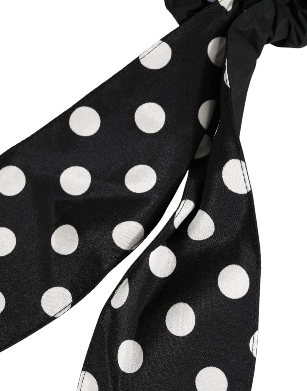 Indulge in the exquisite Dolce & Gabbana Black Cotton Polka Dot Scarf Tie Hair Scrunchie, a timeless accessory that embodies Italian craftsmanship and luxurious elegance.