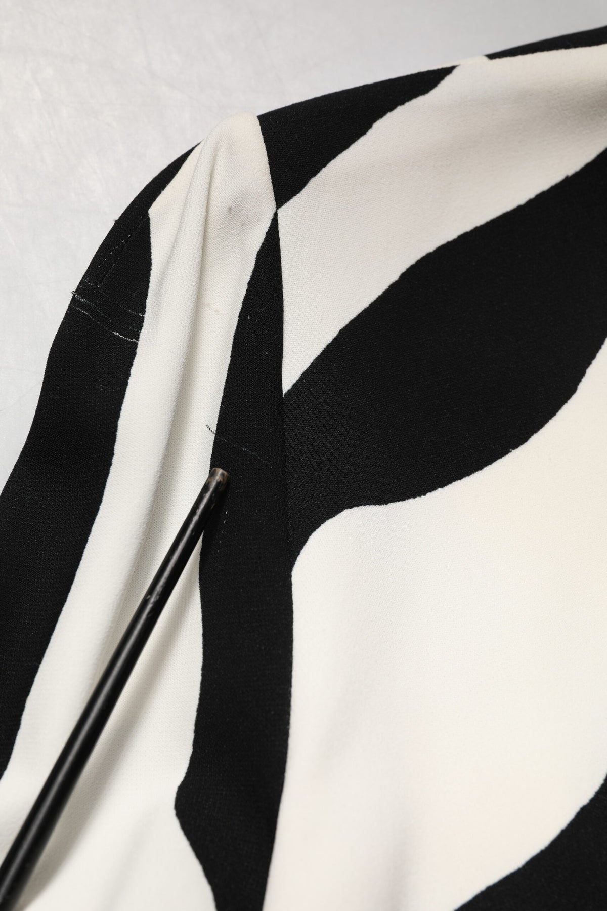 Elevate your elegance with the Dolce & Gabbana Black White Zebra Viscose Sheath Midi Dress, a masterpiece of haute couture that embodies luxurious craftsmanship and timeless allure.