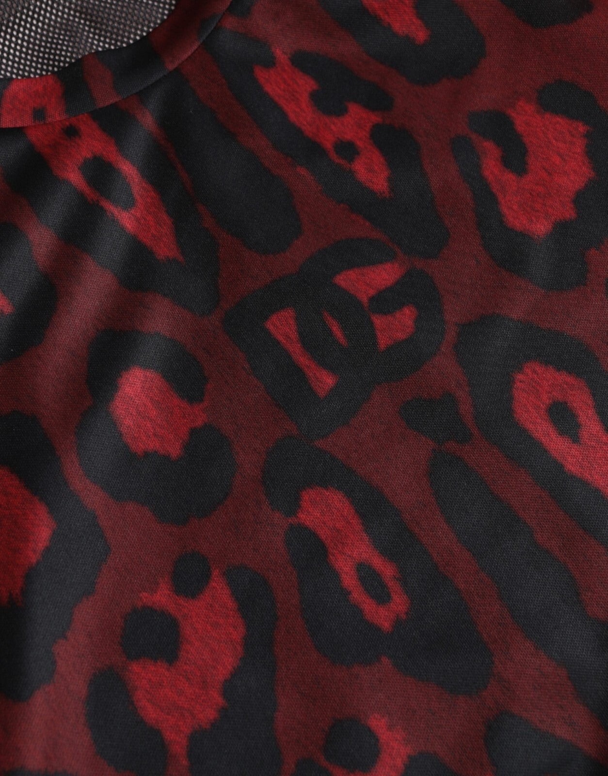 Indulge in the exquisite allure of Dolce & Gabbana's Red Leopard Print Sleeveless Tank T-shirt, where luxurious Italian craftsmanship meets bold design for the discerning individual.