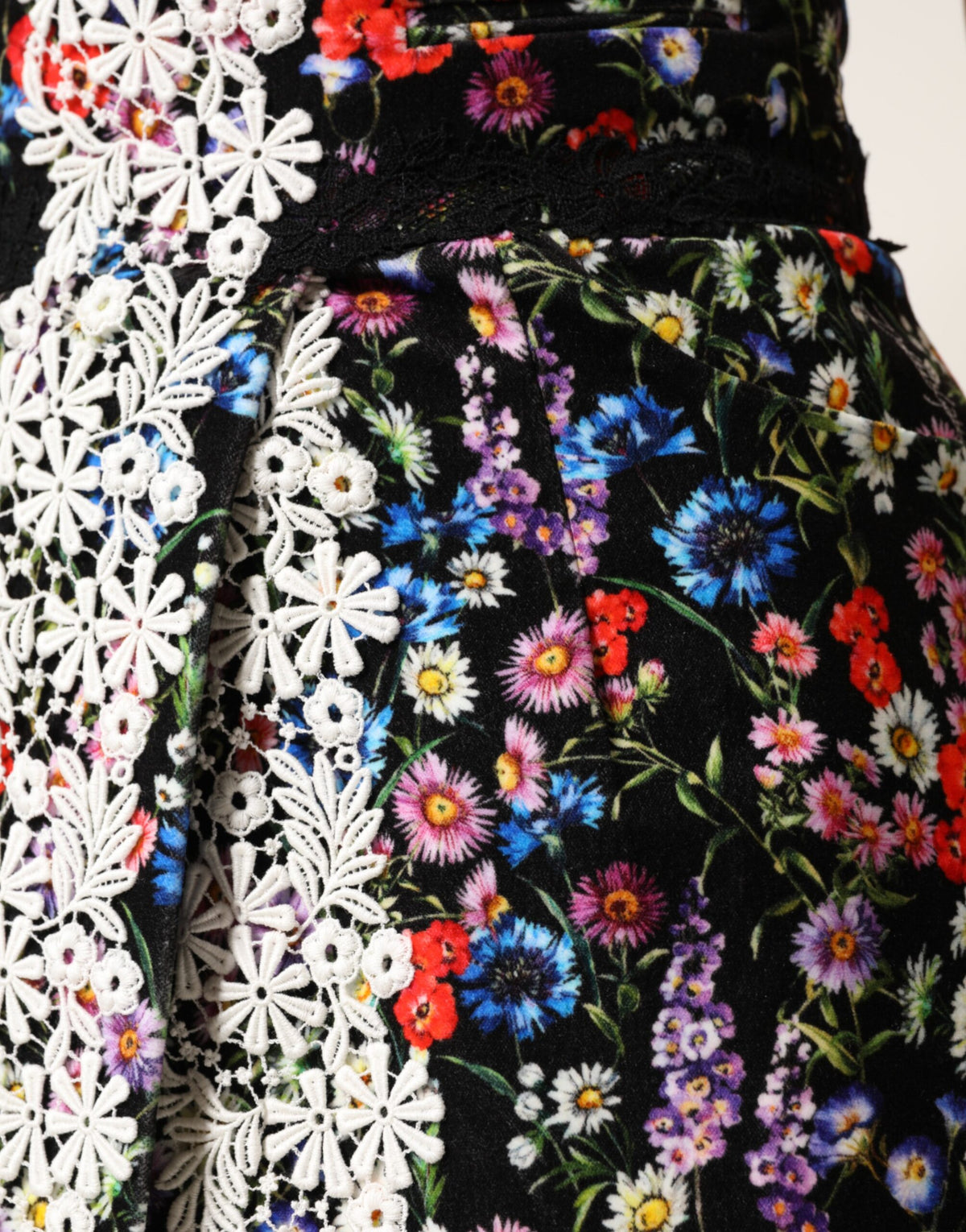 Indulge in the exquisite Dolce & Gabbana Black Floral Lace Cotton High-Waist Mini Skirt, a masterpiece of Italian craftsmanship that embodies timeless elegance and allure.