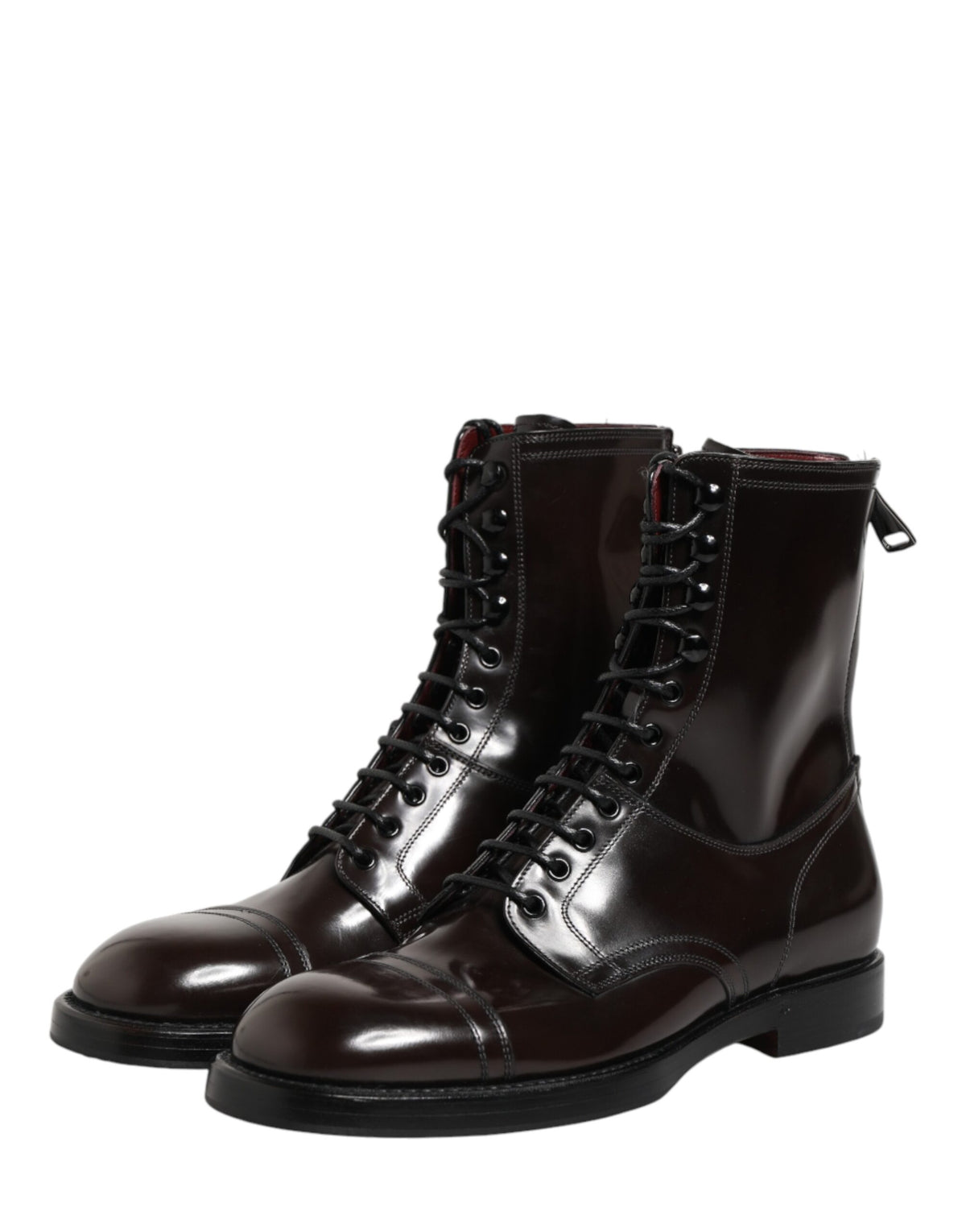 Discover the exquisite Dolce & Gabbana Black Leather Lace Up Mid Calf Boots, a timeless blend of artisanal craftsmanship and luxurious style, perfect for the discerning individual.