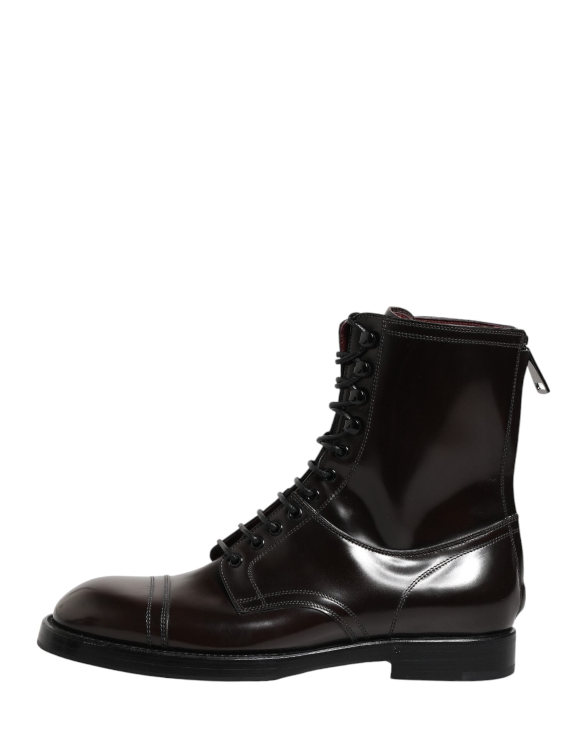 Discover the exquisite Dolce & Gabbana Black Leather Lace Up Mid Calf Boots, a timeless blend of artisanal craftsmanship and luxury, perfect for the discerning individual.
