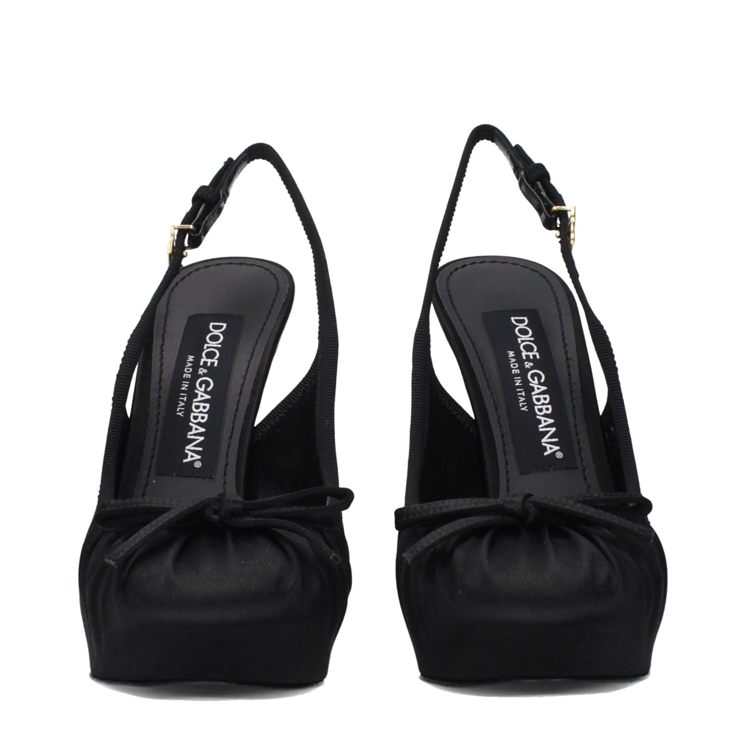 Indulge in the exquisite Dolce & Gabbana Black Satin High Heel Pumps, where luxurious craftsmanship meets refined elegance, perfect for those who command attention.
