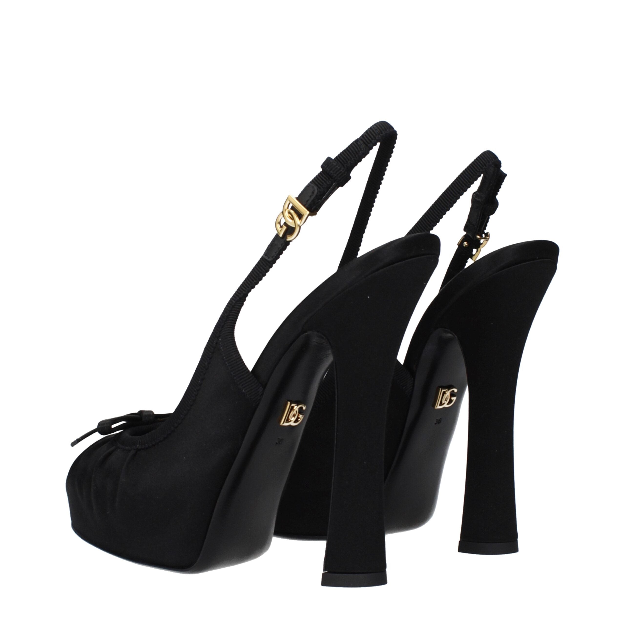 Indulge in the exquisite Dolce & Gabbana Black Satin High Heel Pumps, where luxurious craftsmanship meets refined elegance, perfect for elevating any sophisticated ensemble.