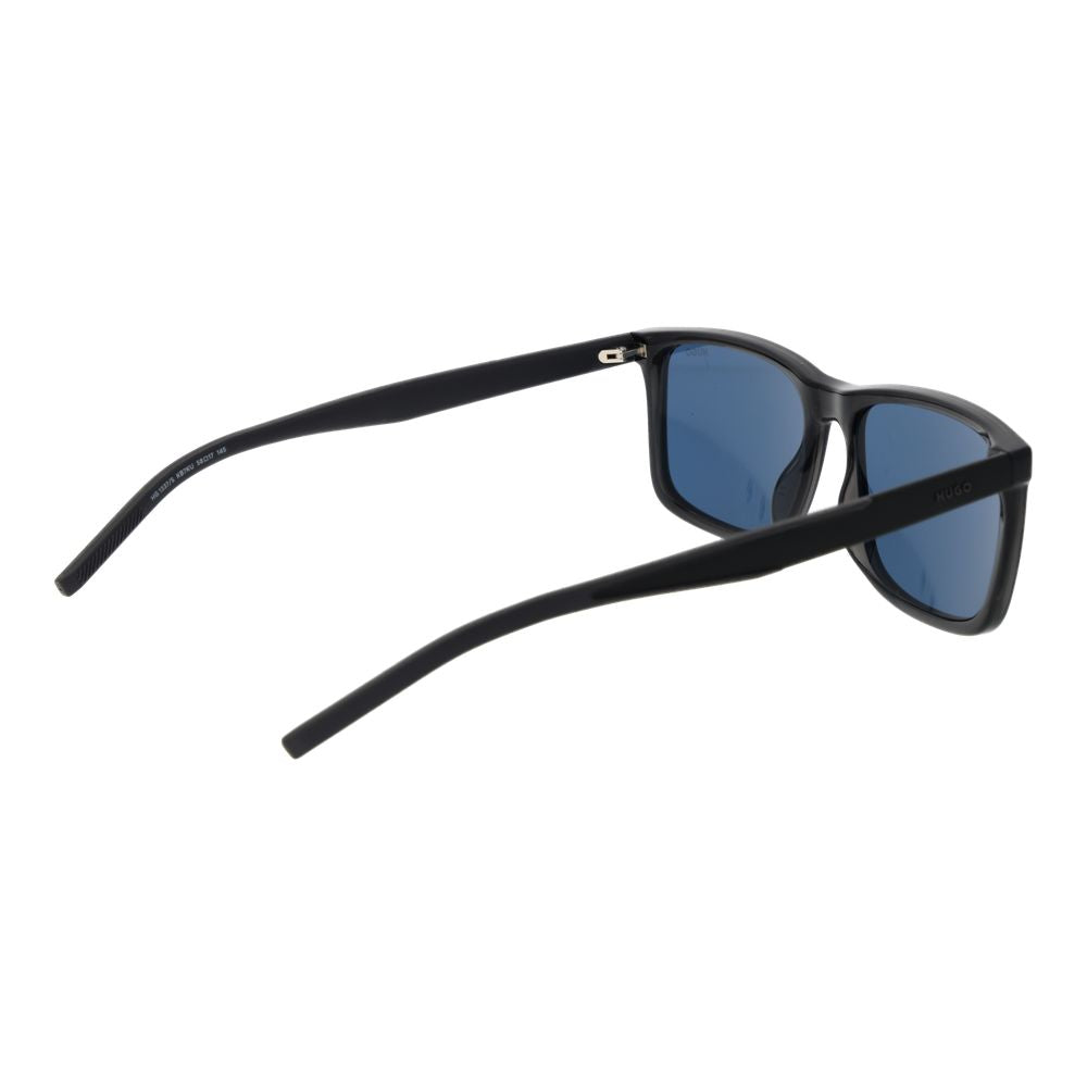 Indulge in the elegance of Hugo Boss Gray Sunglasses, where exquisite craftsmanship meets timeless style, perfect for those who embody sophistication and allure.