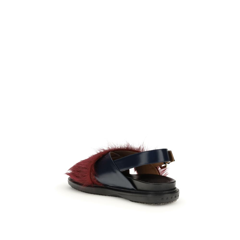 Step into the allure of Marni's Multicolor Calf Leather Bos Taurus Flat Sandals, where exquisite craftsmanship and luxurious fur lining redefine elegance for the discerning individual.